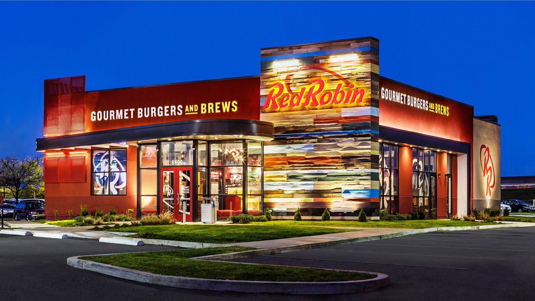 Red Robin CEO Denny Marie Post got inked after employees improved their service grades.