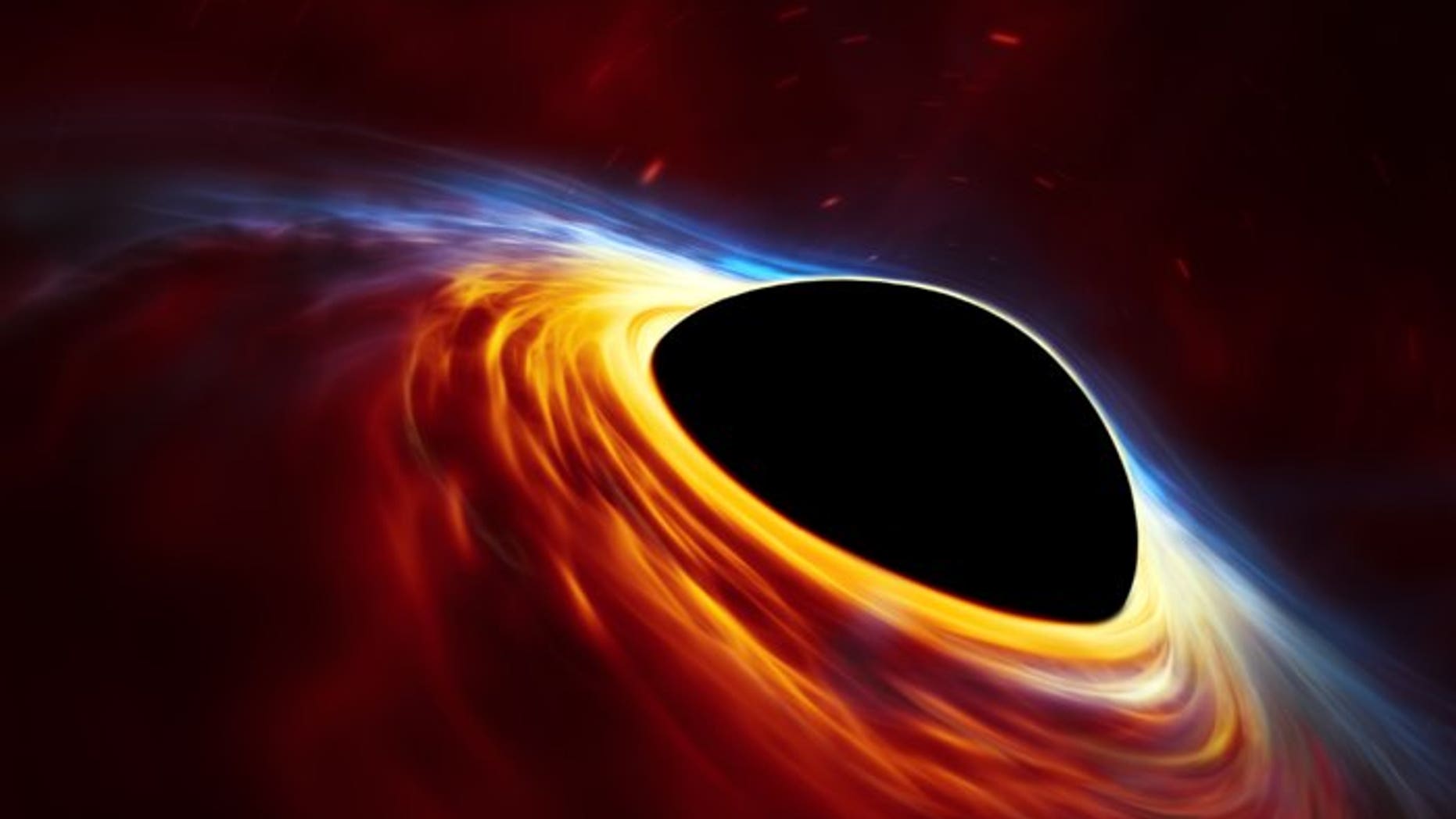 This artist’s impression depicts a rapidly spinning supermassive black hole surrounded by an accretion disc. This thin disc of rotating material consists of the leftovers of a Sun-like star which was ripped apart by the tidal forces of the black hole. Shocks in the colliding debris as well as heat generated in accretion led to a burst of light, resembling a supernova explosion.