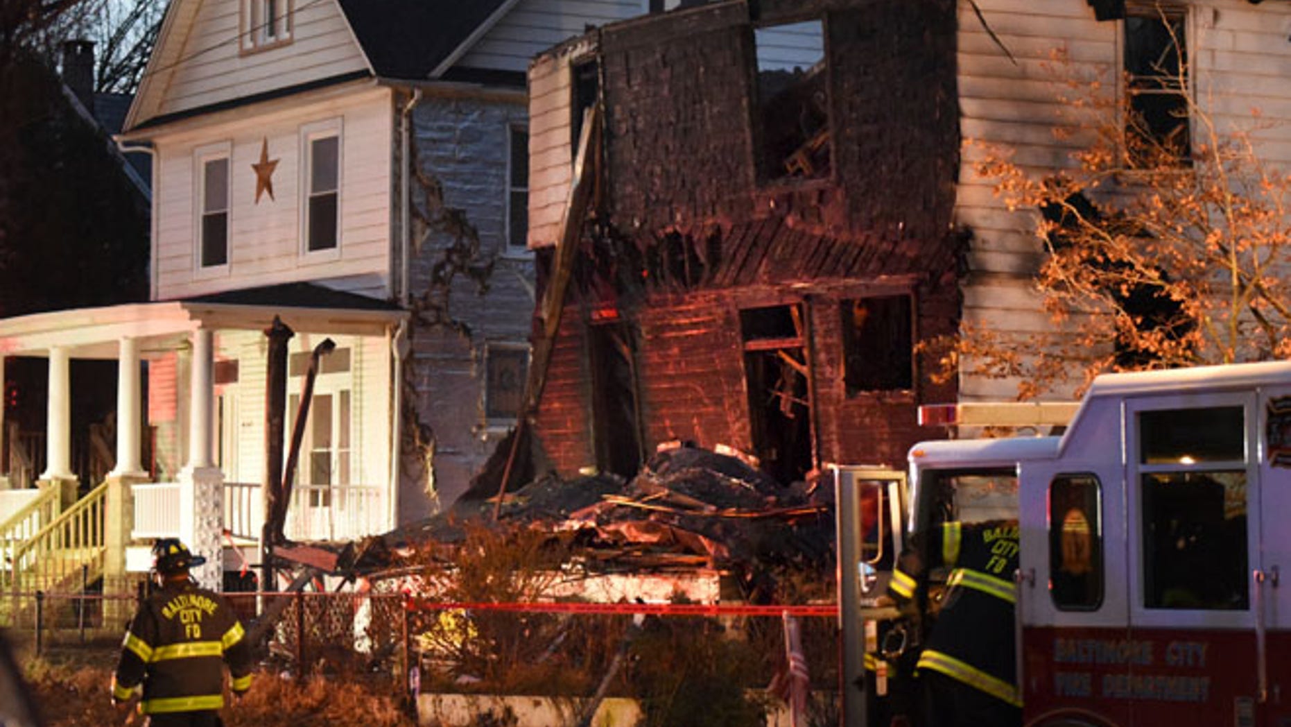 Baltimore City firefighters remain on the scene early Thursday