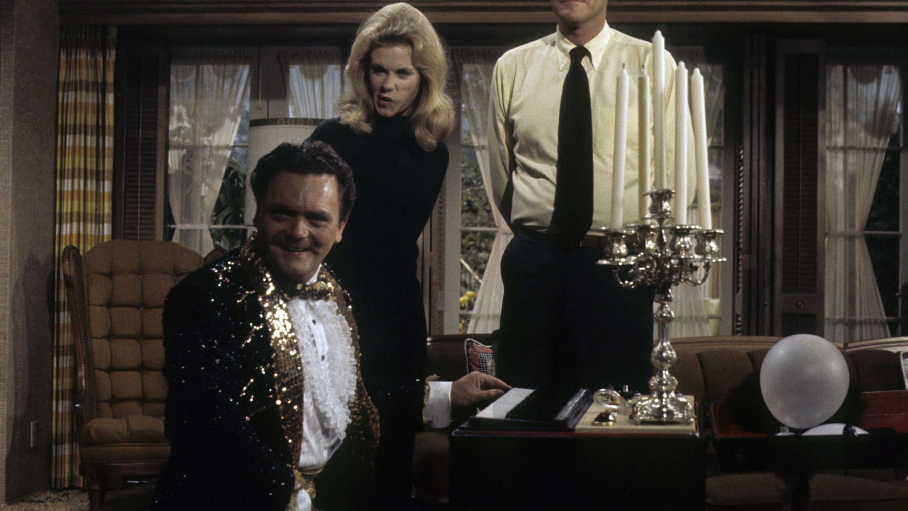 From l-r: Bernard Fox, Elizabeth Montgomery and Dick Sargent in an episode of "Bewitched" titled "Samantha's Magic Potion. It aired on December 17, 1970.