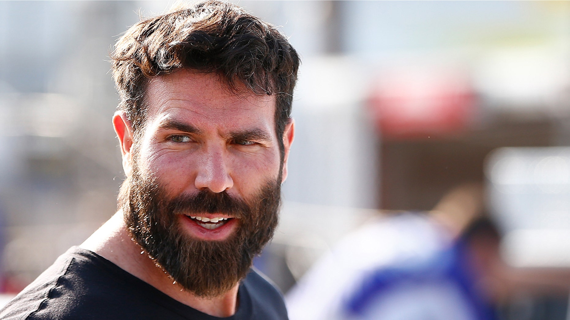 Poker player Dan Bilzerian attends qualifying for the NASCAR Sprint Cup Series Toyota Owners 400 at Richmond International Raceway on April 24, 2015 in Richmond, Virginia.