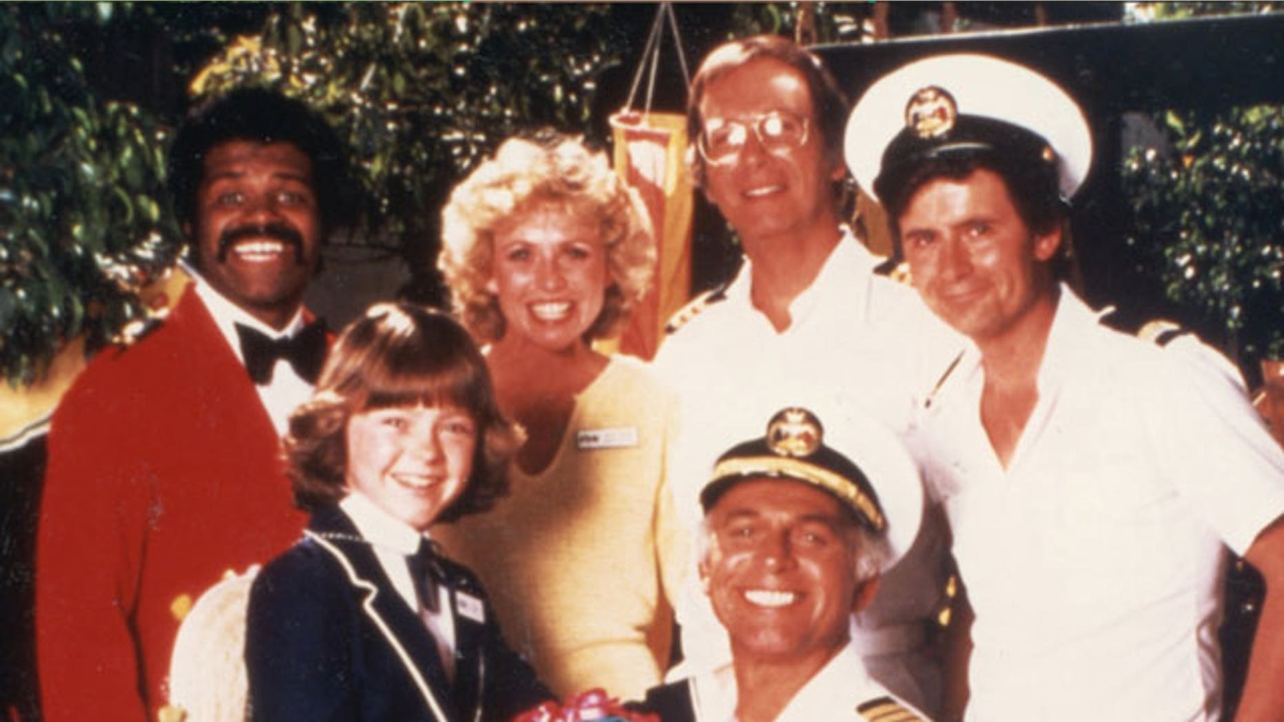 "The Love Boat" cast. Front row from left. Ted Lange, Lauren Tewes, Bernie Kopell, Fred Grandy. Bottom row. Jill Whelan, Gavin MacLeod.