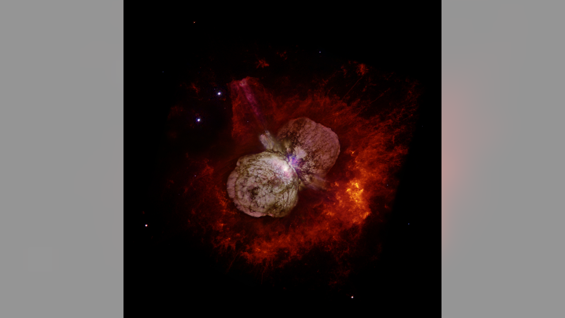 The star system Eta Carinae erupted in the 1840s, from Earth's perspective, creating the Homunculus Nebula visible in this image from the Hubble Space Telescope. New work shows the system spitting ultrafast cosmic rays.