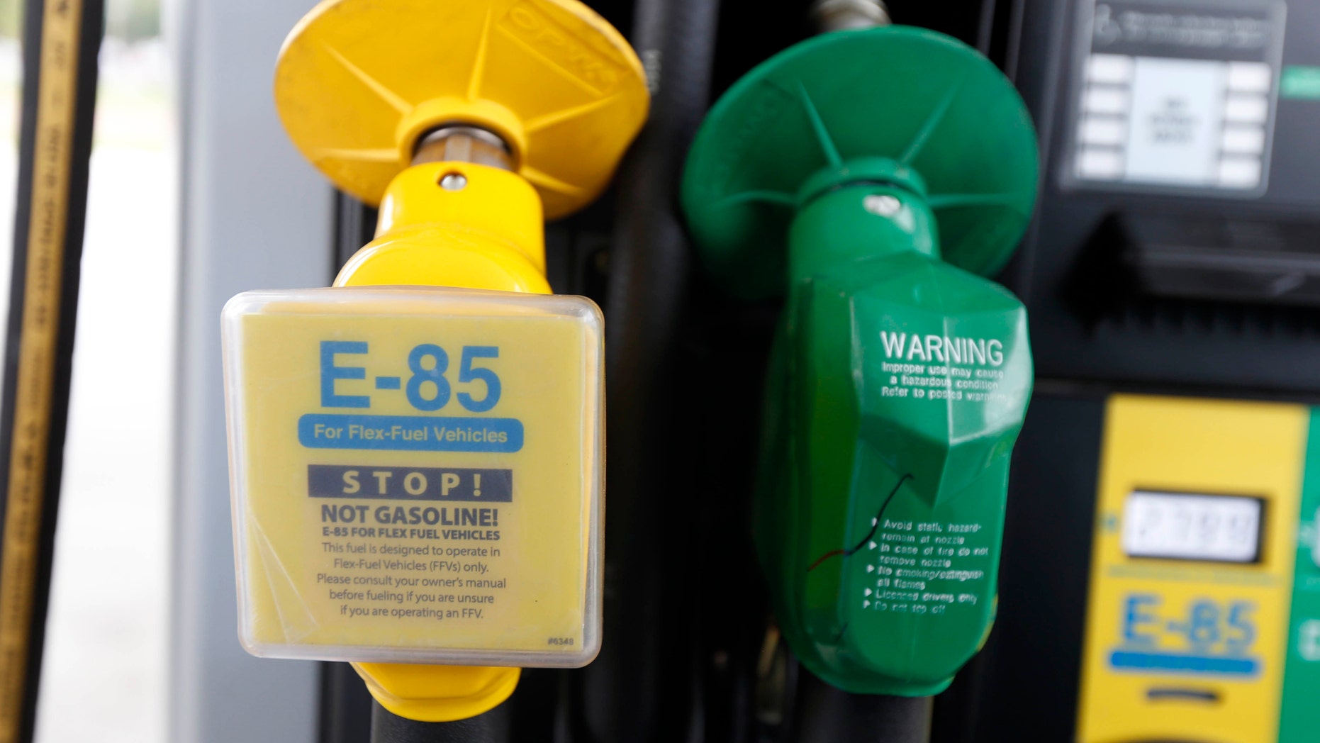 Aug. 9, 2014 –FILE photo of nozzles for biofuel E-85, and traditional gasoline at a gas station in Batesville, Miss. (AP)
