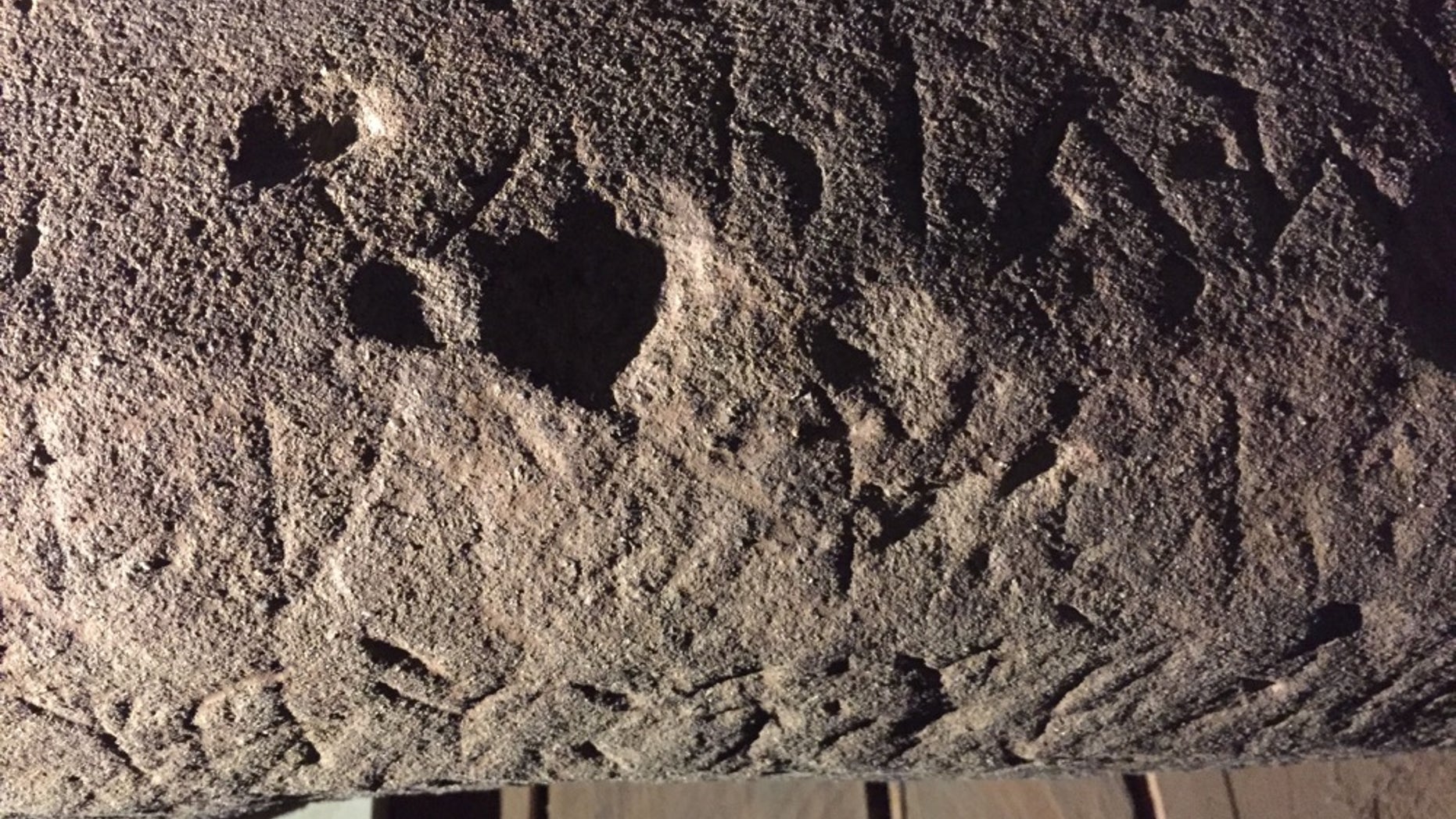 A close-up of a stele found at Poggio Colla, a site of religious ritual for the ancient Etruscans.