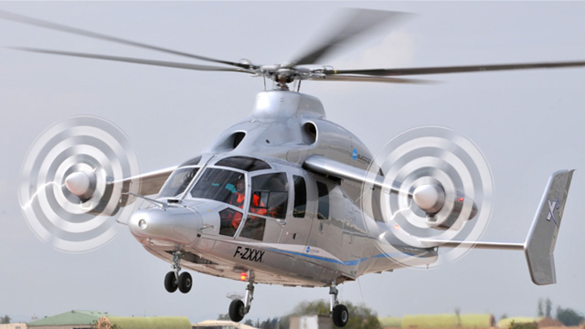 The Eurocopter's X3 high-speed hybrid helicopter demonstrator is seen at the Istres flight testing center, September 27, 2010. The X3 protoype, which combines forward-facing propeller engines astride two short aircraft wings with overhead rotor blades, was unveiled at the European company's factory in southern France following months of secrecy about the project.