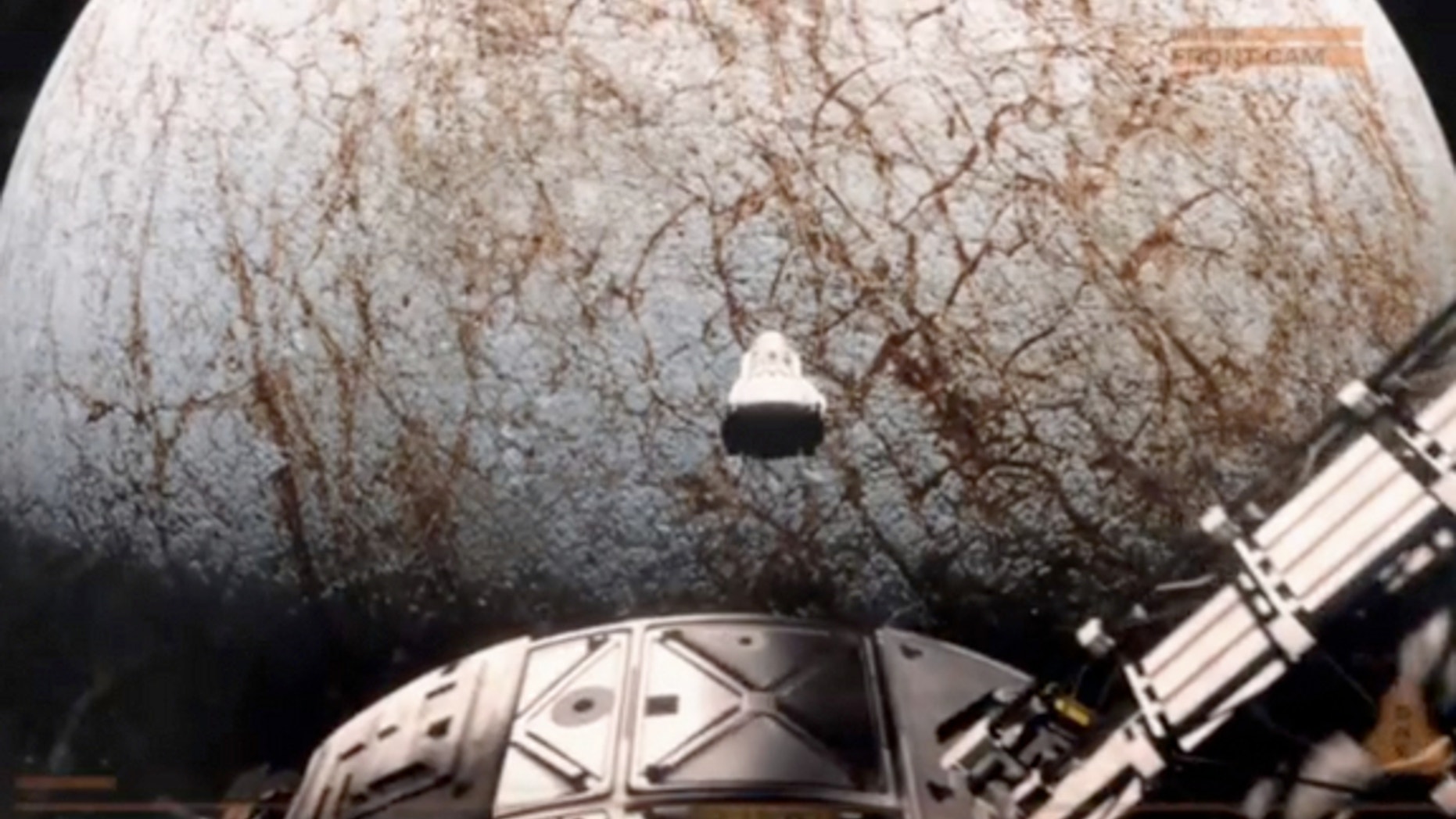 A screenshot from the teaser for "The Europa Report," a sci-fi film that depicts a team of astronauts exploring Jupiter's icy moon Europa for alien life.