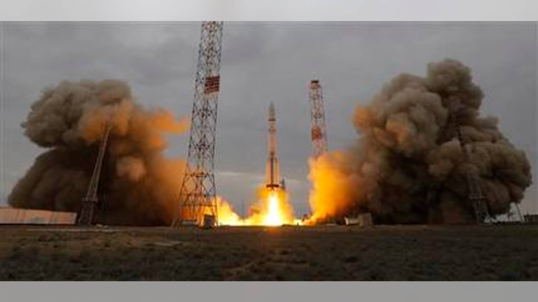 The Proton-M rocket booster blasts off at the Russian leased Baikonur cosmodrome, Kazakhstan, Monday, March 14, 2016. Europe and Russia launched a joint mission Monday to explore the atmosphere of Mars and hunt for signs of life on the red planet. (AP Photo/Dmitri Lovetsky)