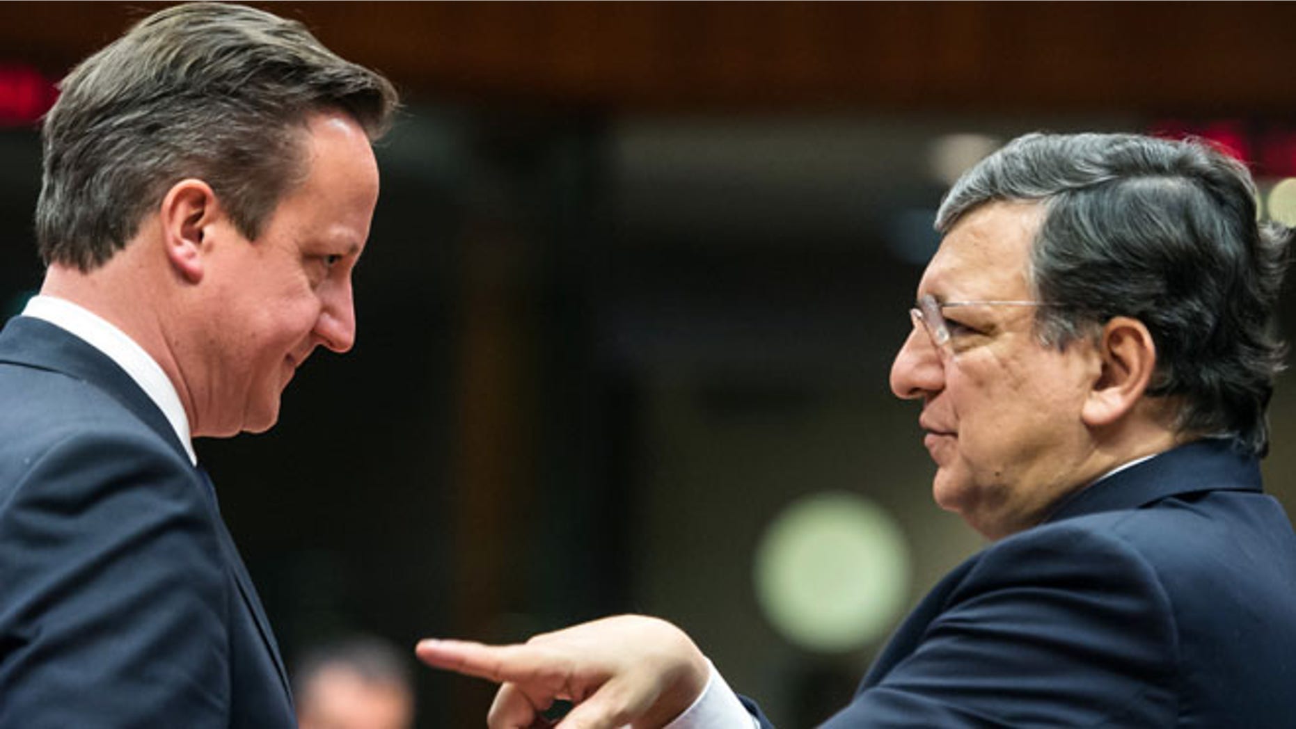 Mar. 20, 2014: European Commission President Jose Manuel Barroso, right, gestures while speaking with British Prime Minister David Cameron during a round table meeting an EU summit in Brussels.