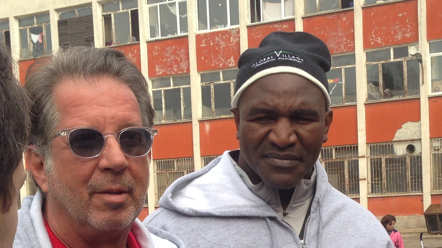 Rocker-turned humanitarian Yank Barry (l.), and former heavyweight champion Evander Holyfield (r.), are helping Syrian refugees in Bulgaria.