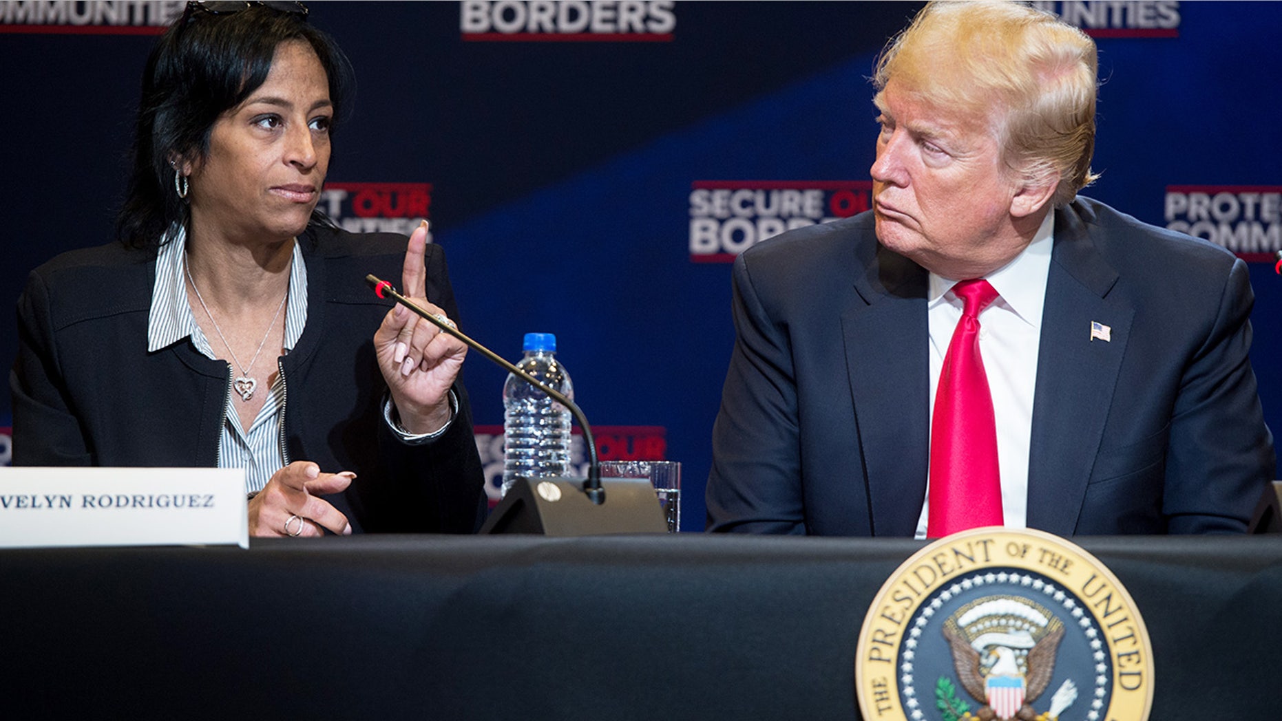 Evelyn Rodriguez, who was struck and killed by an SUV on Friday, appears with President Trump at a forum on MS-13 gang violence in Bethpage, N.Y., May 23, 2018. Just months earlier, Rodriguez's daughter was brutally murdered by MS-13 members, according to authorities.