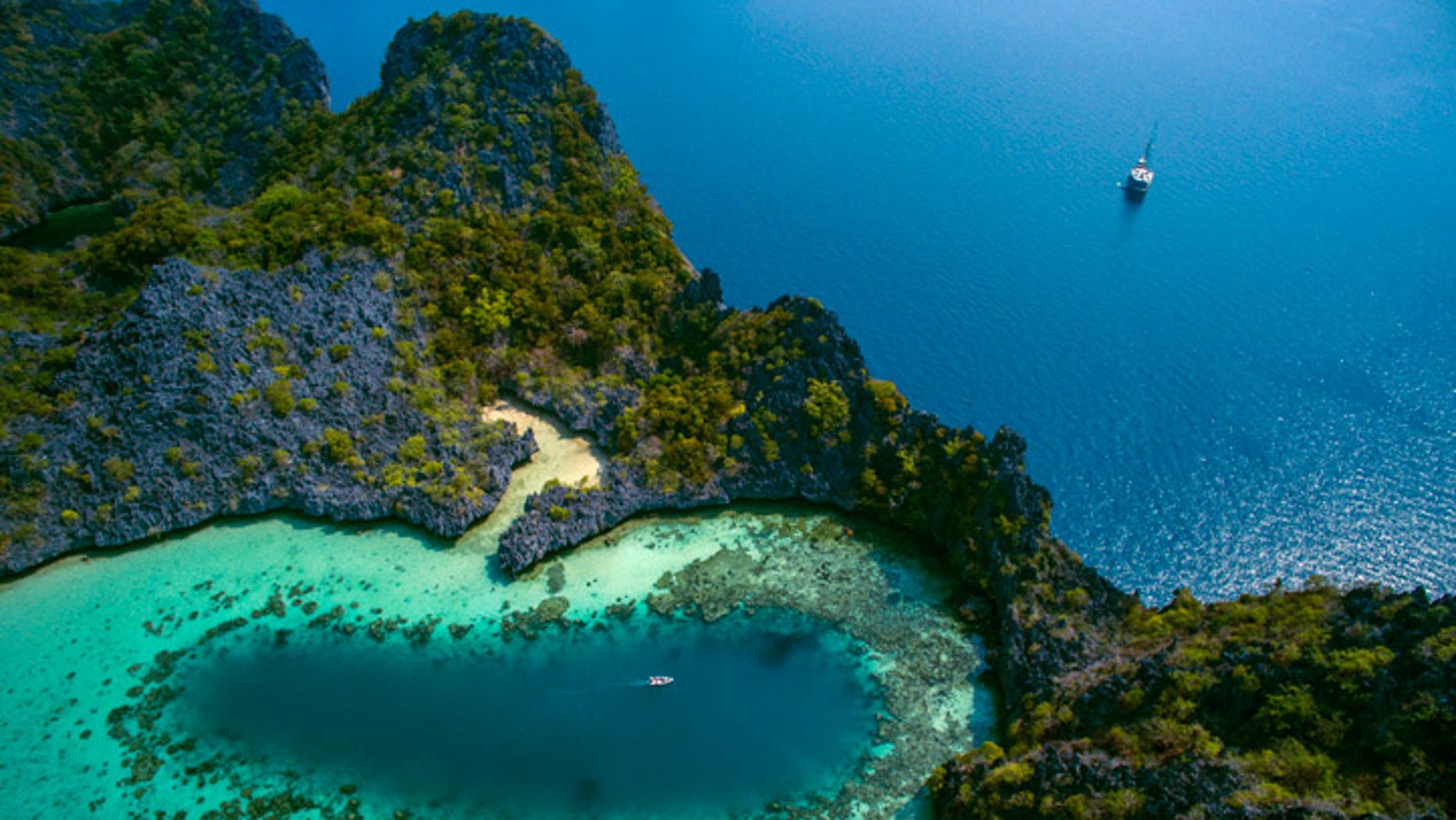 The stunning Mergui Archipelago in Myanmar is one Black Tomato's premier drone-worthy destinations with its deep cobalt ocean, dramatic escarpments and white beaches.