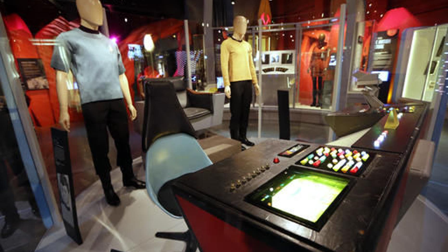 Costumes and pieces of the set of the "Star Trek" TV series are displayed in the exhibit, "Star Trek: Exploring New Worlds," as part of a 50th anniversary celebration of the TV show and films at the EMP Museum, in Seattle. The exhibit opens on Saturday.