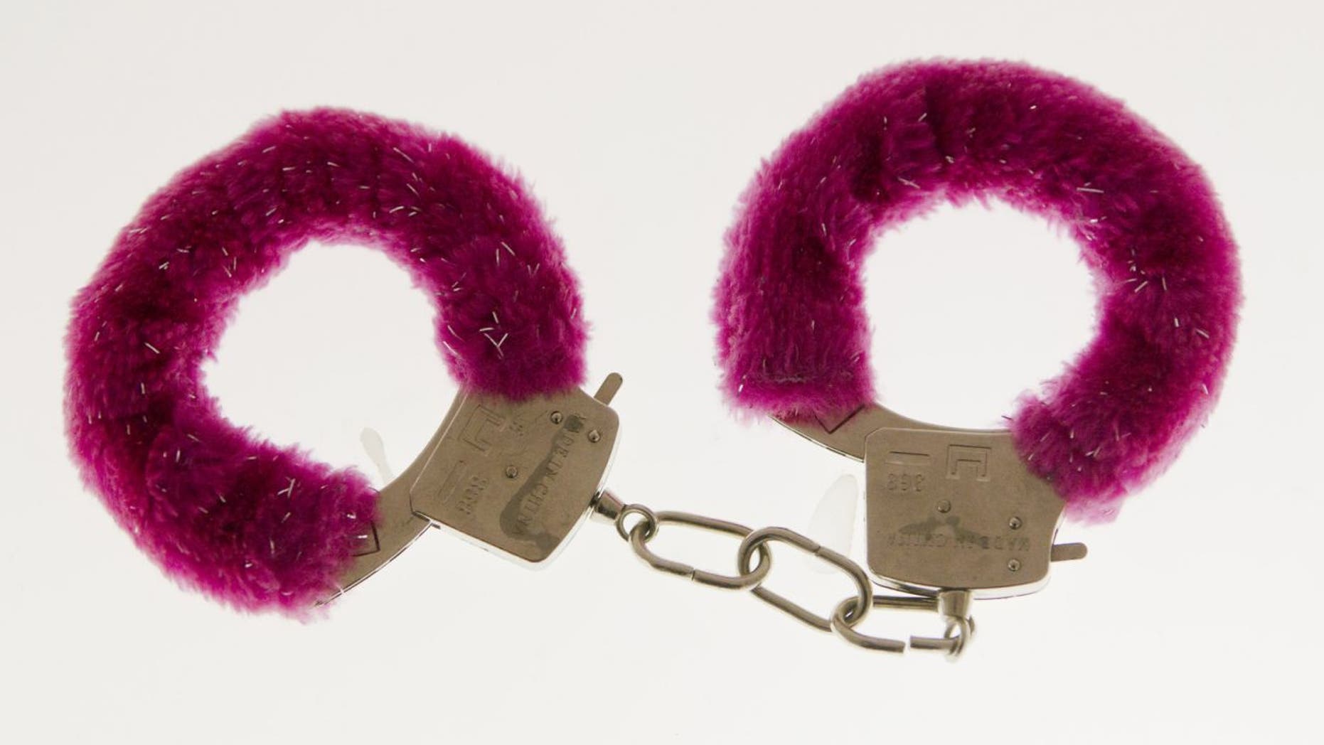 A pair of fuzzy handcuffs displayed at the original Museum of Broken Relationships in Zagreb, Croatia tossed aside by a former lover.