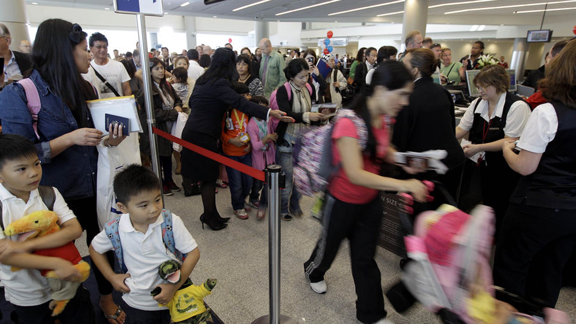 A major international hub: Passengers board a plane to Tokyo, departing the Maynard Holbrook Jackson Jr. International Terminal at Hartsfield-Jackson Atlanta International Airport in May 2012.