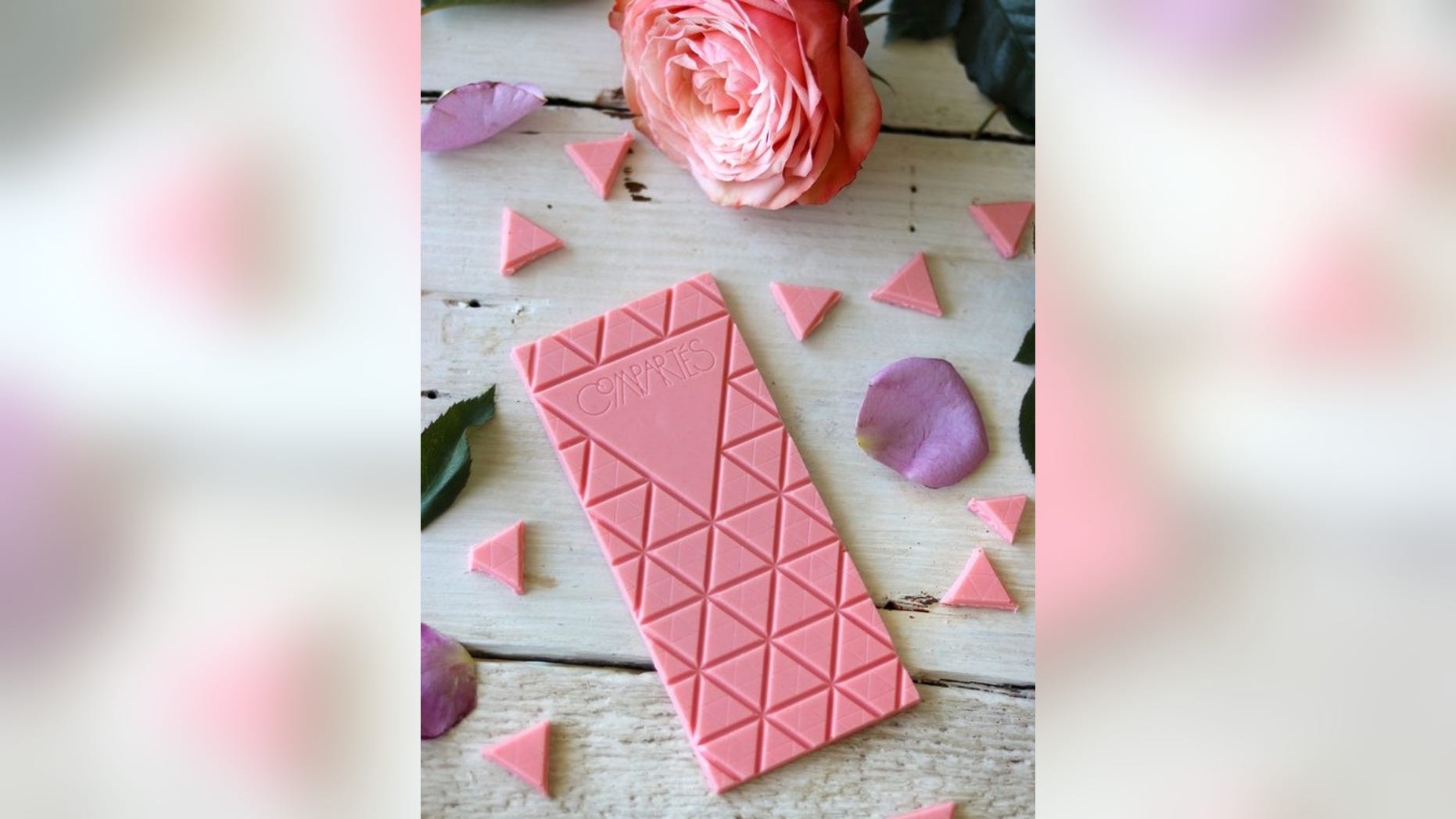 This pink white chocolate bar is infused with real rosé wine and decked out in edible crystalized rose petals.