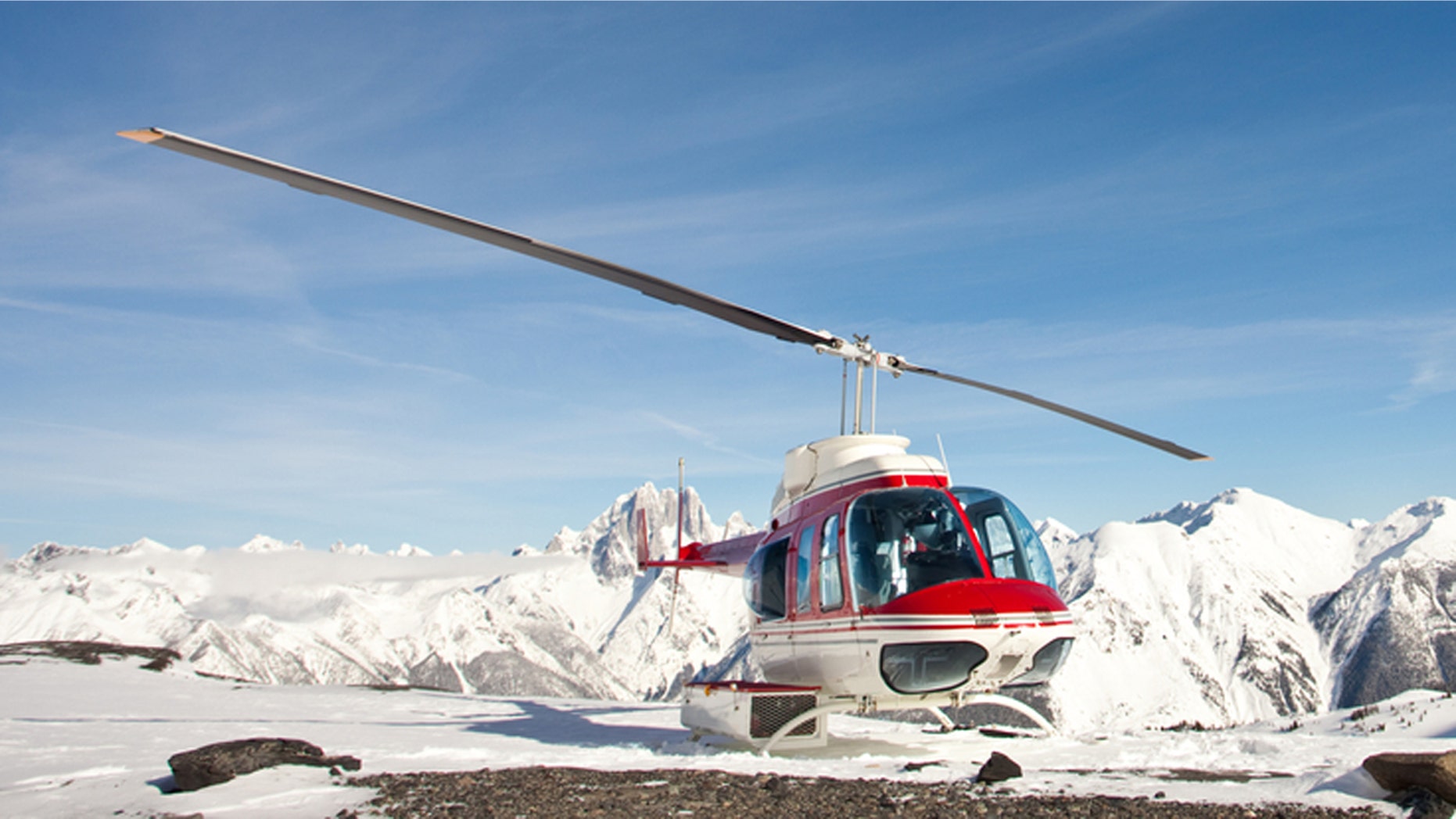Arrive by chopper and hike through a glacier in Alaska.