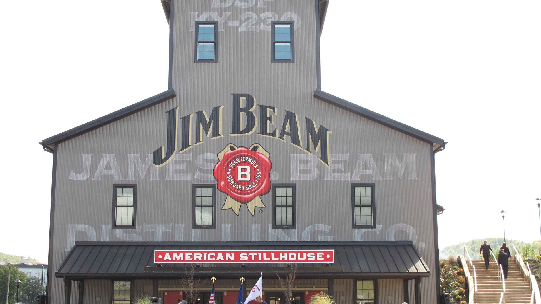 FILE - This Oct. 3, 2012 file photo shows the Jim Beam visitors center at its central distillery in Clermont, Ky. Another round of voting produced the same results in a labor dispute for the company behind Jim Beam whiskey, as workers at two Kentucky distilleries rejected a revised contract offer Friday, Oct. 14, 2016 with a strike looming. (AP Photo/Bruce Schreiner)