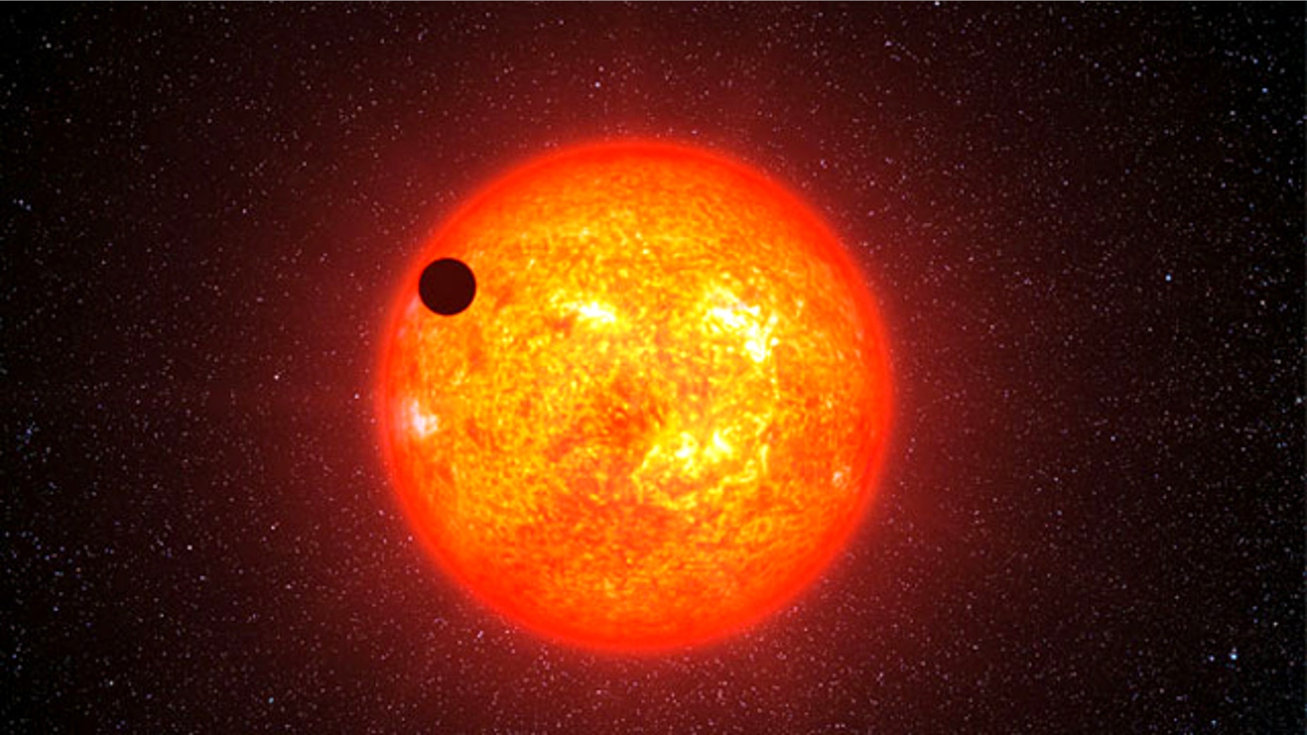 The alien planet GJ 1214b passes in front of its host star in this artist�s impression. The so-called transit of the planet in front of the star allowed scientists to probe its atmosphere for the first time.