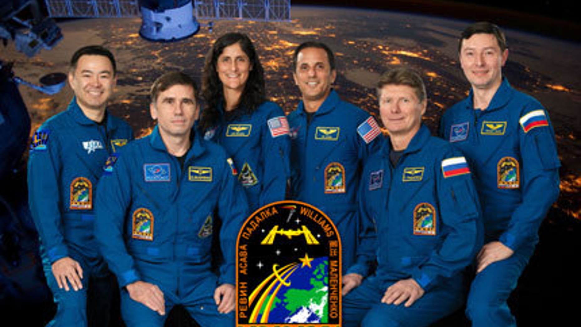 Pictured from the left are Flight Engineers Akihiko Hoshide, Yuri Malenchenko, Sunita Williams and Joe Acaba, Commander Gennady Padalka and Flight Engineer Sergei Revin.