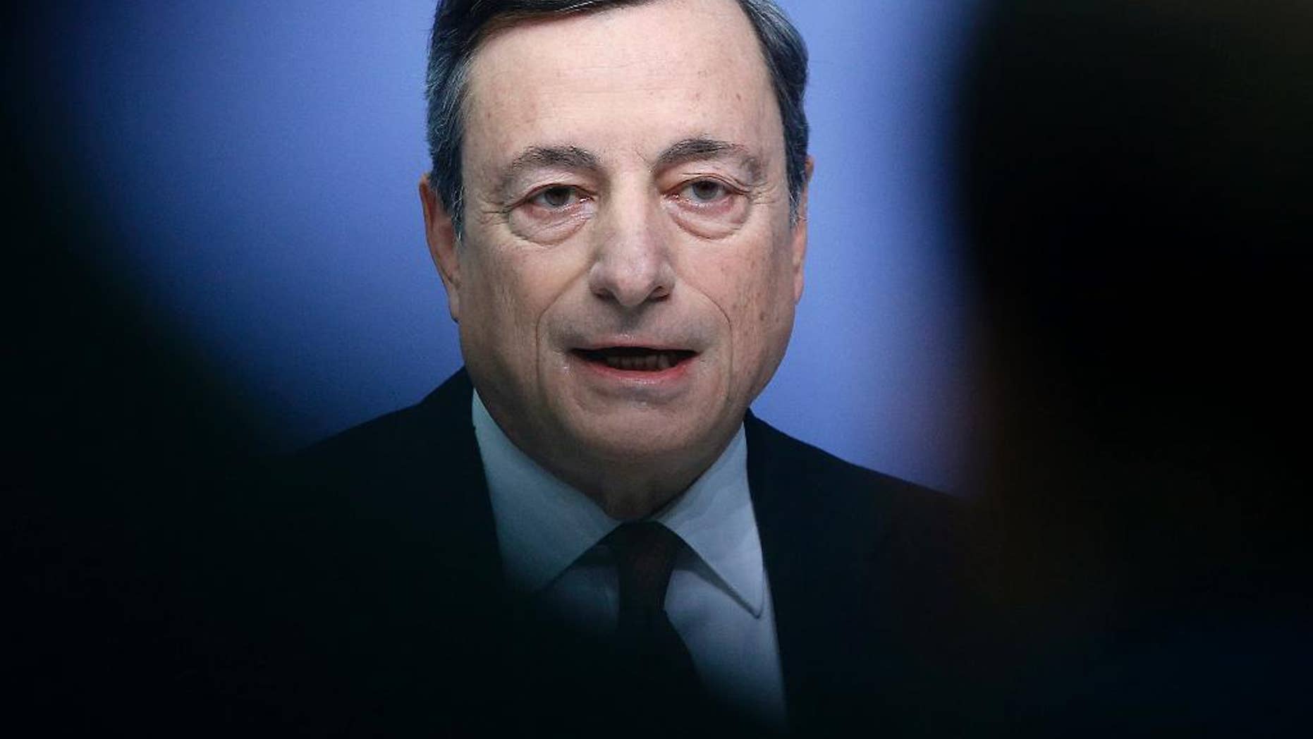 President of the European Central Bank Mario Draghi speaks during a news conference after a meeting of the governing council in Frankfurt, Germany, Thursday, Jan. 19, 2017. (AP Photo/Michael Probst)