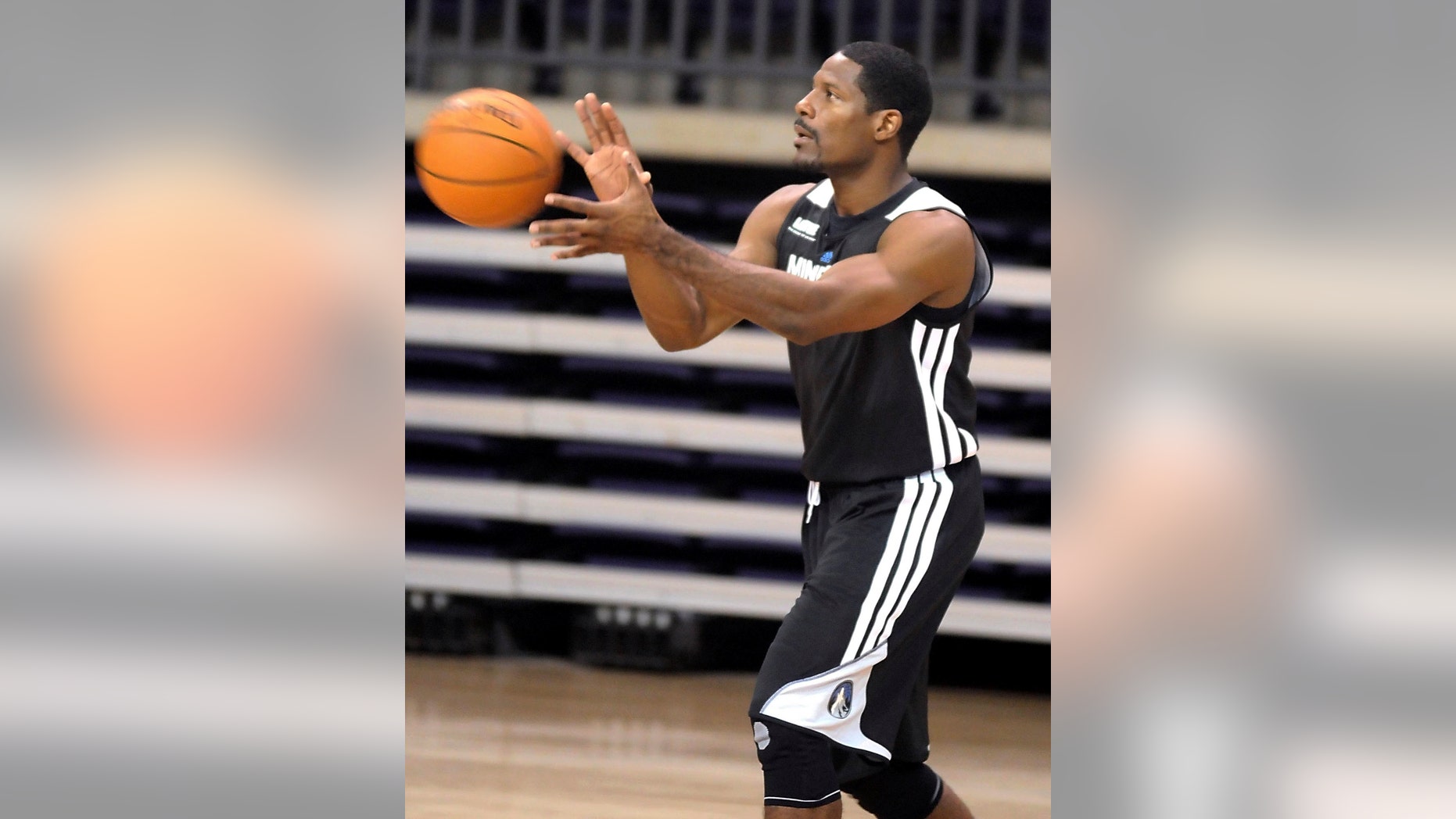 Minnesota Timberwolves guard Othyus Jeffers takes a pass during the NBA basketball team's training camp Tuesday, Oct. 1, 2013, in Mankato, Minn. (AP Photo/Mankato Free Press, Pat Christman)