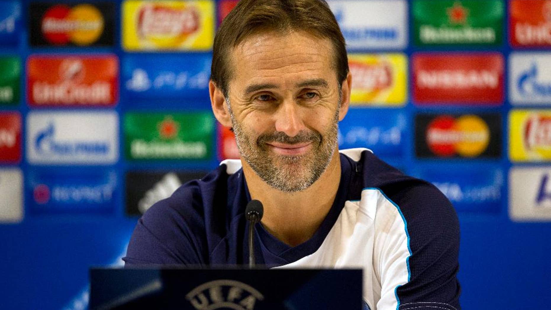 FILE - In this Tuesday, Nov. 3, 2015 file photo, Porto's then head coach Julen Lopetegui smiles during a press conference ahead of a group G Champions League soccer match against Maccabi Tel Aviv in Haifa, Israel. Spain’s soccer federation on Thursday, July 18, 2016 says Julen Lopetegui is the new coach of the national team. Lopetegui replaces Vicente Del Bosque, who resigned after Spain’s elimination in the round of 16 of the European Championship last month. (AP Photo/Ariel Schalit, file)