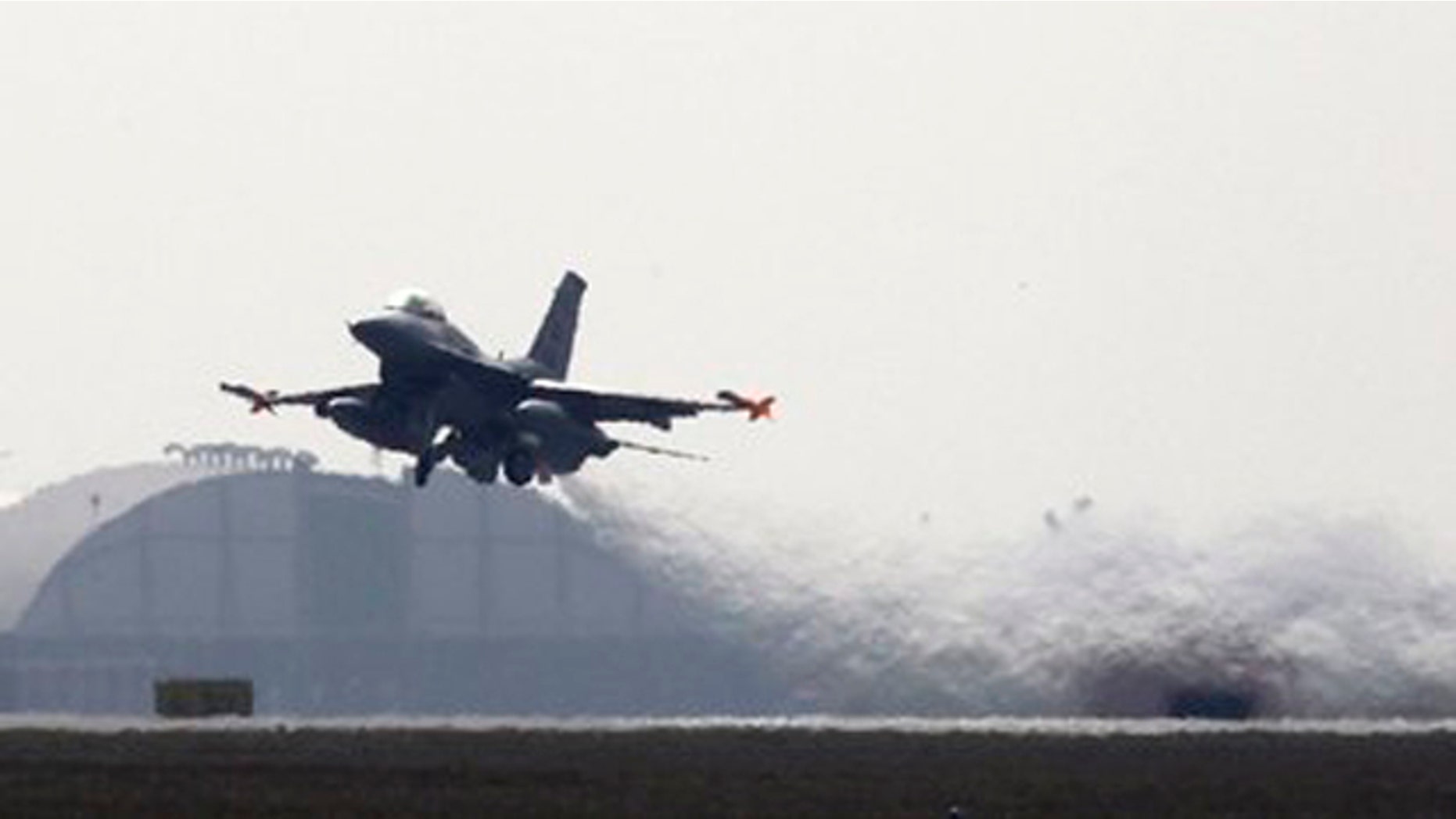 A 31st Fighter Wing United States Air Force F-16 jet fighter takes off at the Aviano NATO airbase in Aviano, Italy, March 25.