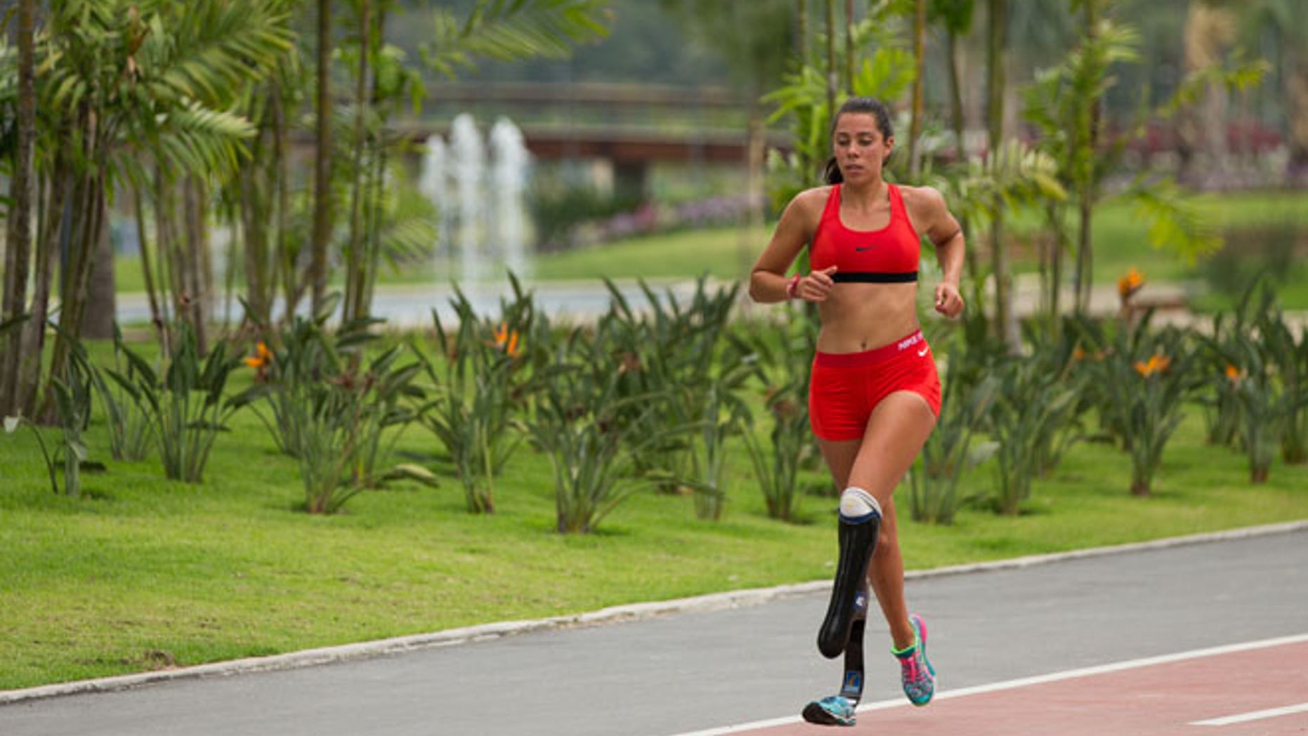 An athlete takes a run on the track in the Paralympic Village in preparation for the Paralympic Games in Rio de Janeiro, Brazil