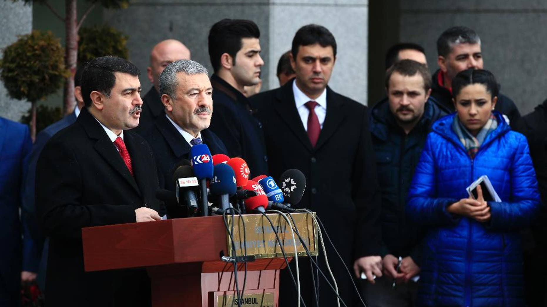 Istanbul Gov. Vasip Sahin, left, accompanied by Police Chief Mustafa Caliskan, second from left, talks to the media during a news conference regarding the arrest of a suspect of New Year's nightclub attack in Istanbul, Tuesday, Jan. 17, 2017. Turkish officials on Tuesday confirmed that the gunman who carried out the deadly New Year's attack on an Istanbul nightclub, which was claimed by the Islamic State group, has been detained. (AP Photo/Lefteris Pitarakis)