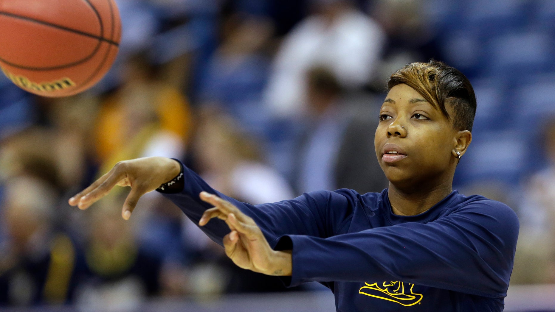 California guard Tierra Rogers passes a ball during practice at the Women's Final Four of the NCAA college basketball tournament, Saturday, April 6, 2013, in New Orleans. California plays Louisville in a national semifinal on Sunday. (AP Photo/Gerald Herbert)