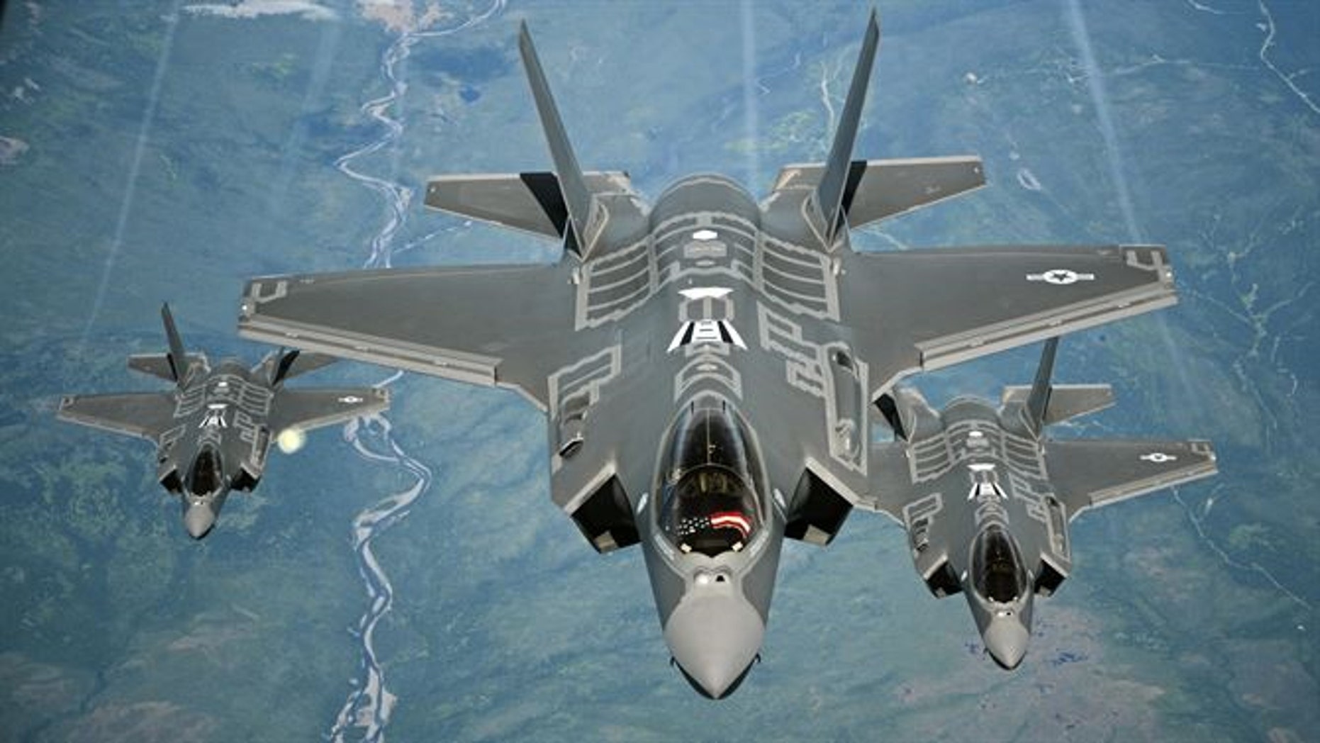 F-35A Lightning II aircraft receive fuel from a KC-10 Extender from Travis Air Force Base, Calif., July 13, 2015, during a flight from England to the U.S. (U.S. Air Force photo/Staff Sgt. Madelyn Brown)