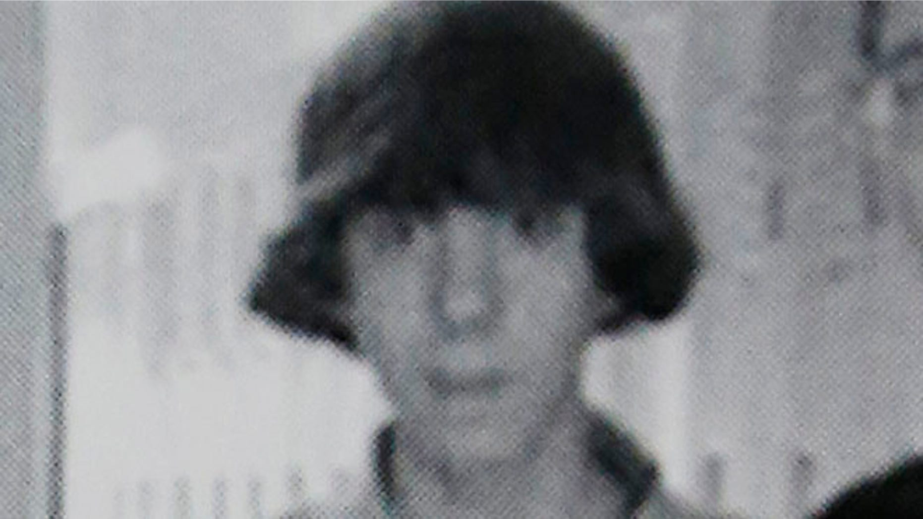 This undated photo shows Adam Lanza posing for a group photo of the technology club which appeared in the Newtown High School yearbook.