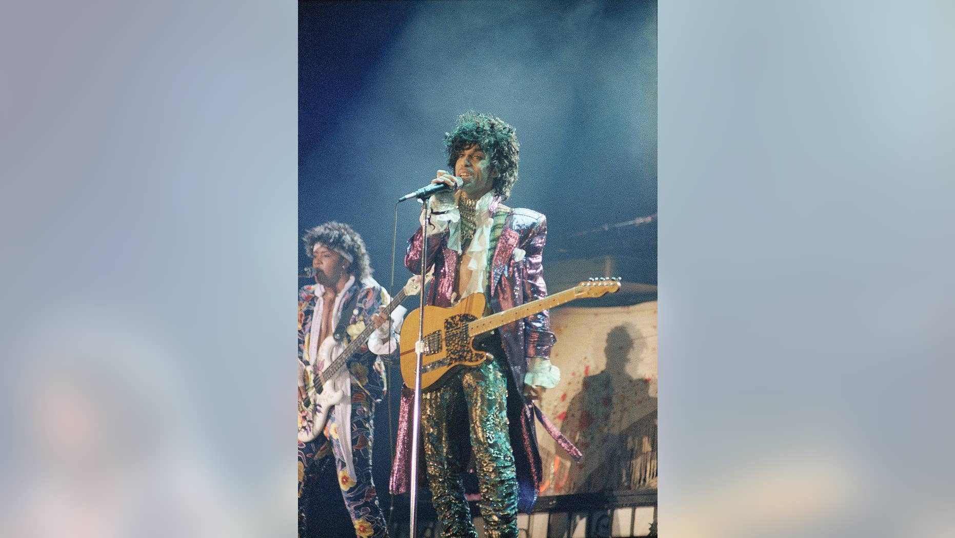 FILE - In this 1985 file photo, singer Prince performs in concert. Prince's old band is reuniting for some live shows following his death. Members of the Revolution made the announcement in a video posted online Tuesday, April 26, 2016. (AP Photo, File)