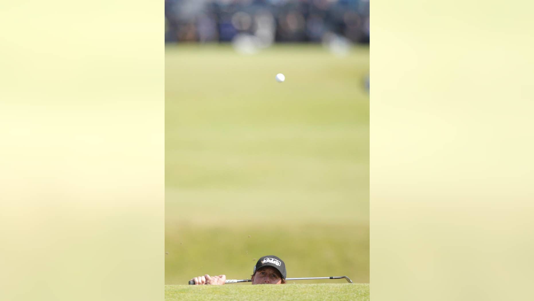 United States’ Phil Mickelson plays to the 11th green during the second round of the British Open Golf Championship at the Old Course, St. Andrews, Scotland, Friday, July 17, 2015. (AP Photo/Alastair Grant)