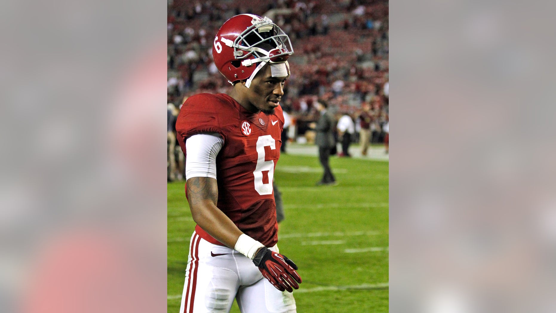 FILE - In this Sept. 21, 2013 file photo, Alabama defensive back Ha Ha Clinton-Dix (6) walks off the field after a win over Colorado State in an NCAA college football game in Tuscaloosa, Ala. Alabama coach Nick Saban suspended Clinton-Dix indefinitely for violating unspecified team rules. Saban announced the suspension of one of the top-ranked Crimson Tide's top defensive players after Wednesday's Oct. 2, 2013, practice. Saban wouldn't say what Clinton-Dix did wrong. (AP Photo/Butch Dill, File)