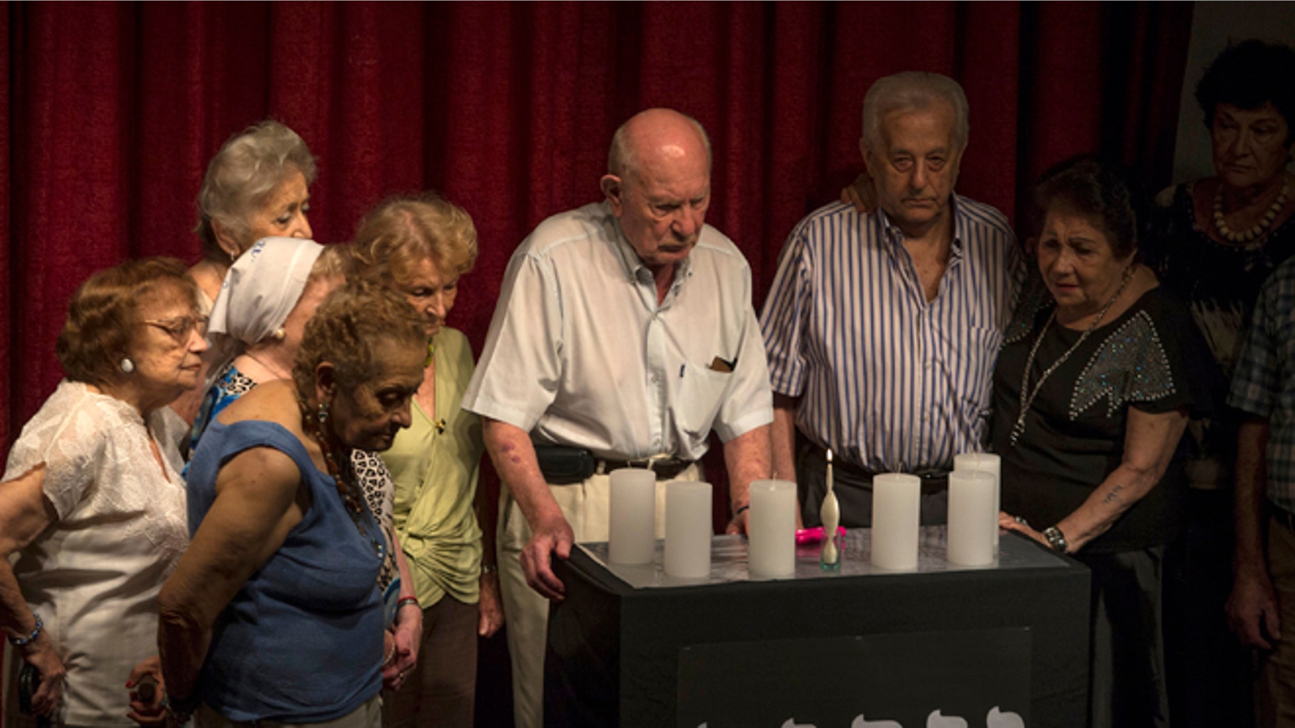 Holocaust survivors take part in a Holocaust Memorial Day ceremony in Buenos Aires, Jan. 27, 2015.