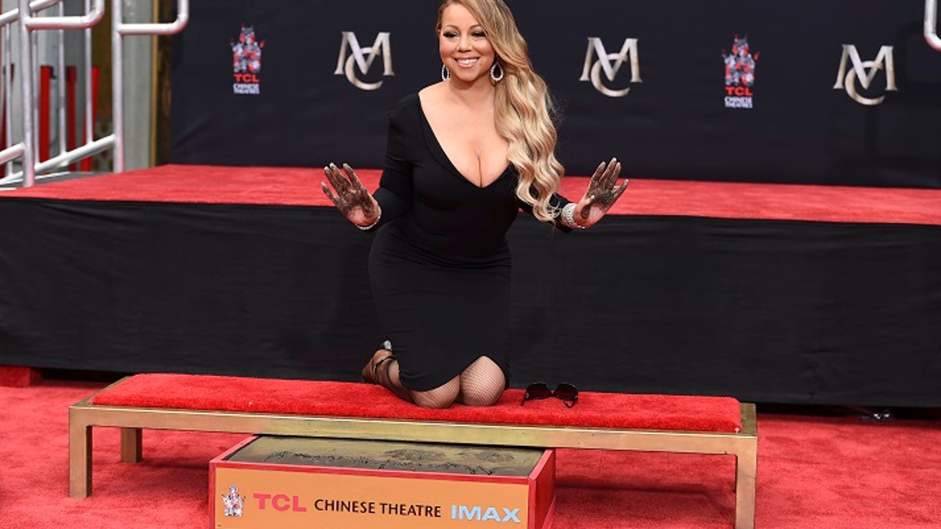 The accuser claims Carey wore revealing clothing and performed “sexual acts with the intent that they be viewed” by him.