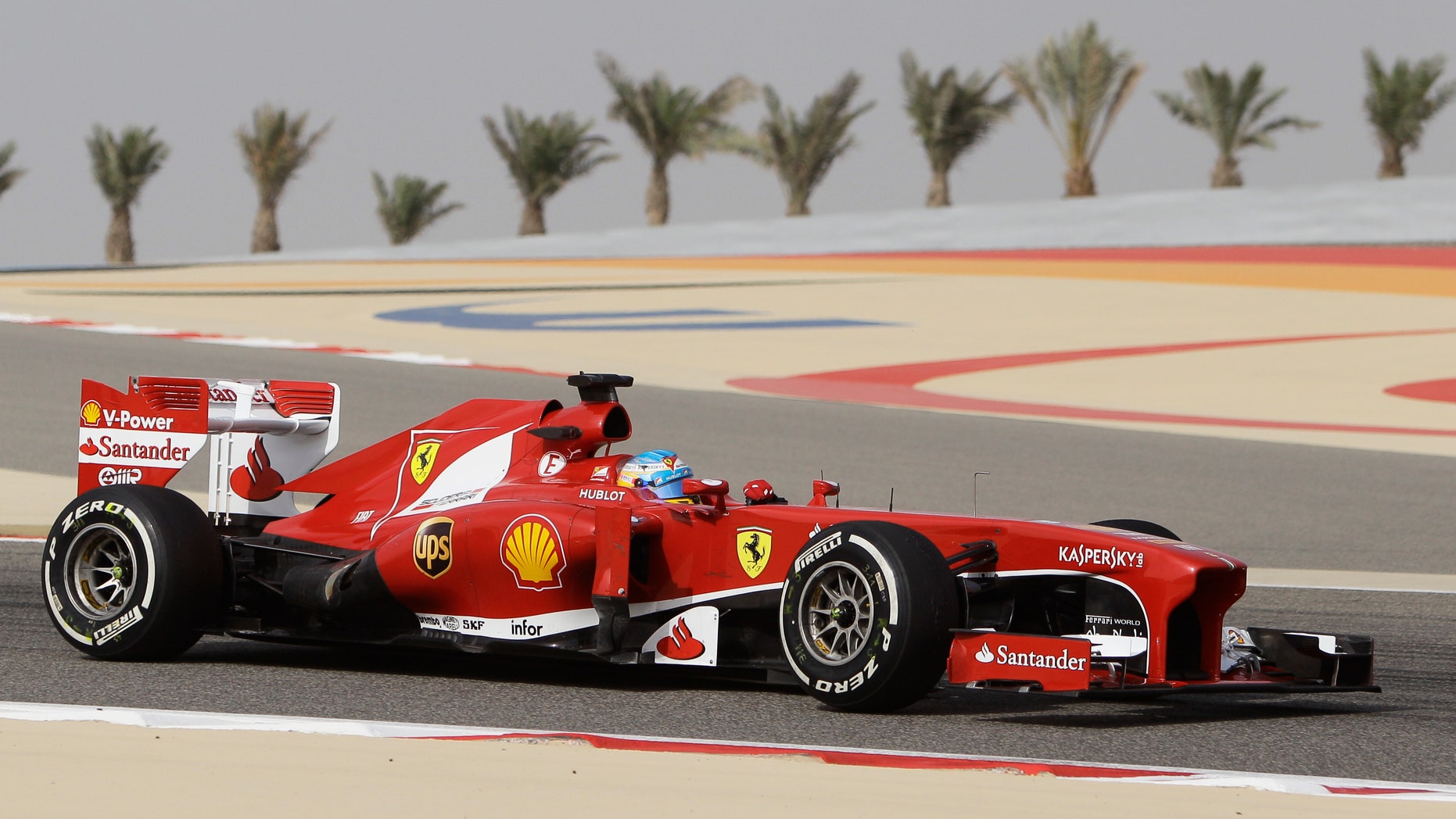 Ferrari driver Fernando Alonso from Spain steers his car during the second practice session of Bahrain Formula One Grand Prix at the Bahrain International Circuit in Sakhir, Bahrain, Friday, April 19, 2013. The Bahrain Formula One Grand Prix will take place on Sunday. (AP Photo/Kamran Jebreili)