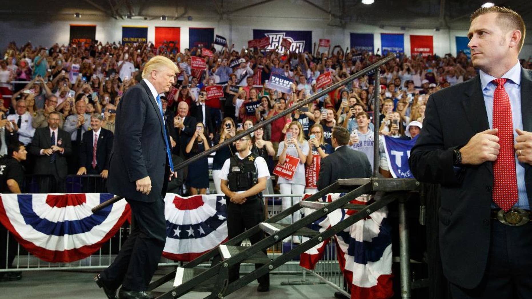 Republican presidential candidate Donald Trump arrives to speak at a campaign rally at High Point University, Tuesday, Sept. 20, 2016, in High Point, N.C. (AP Photo/ Evan Vucci)