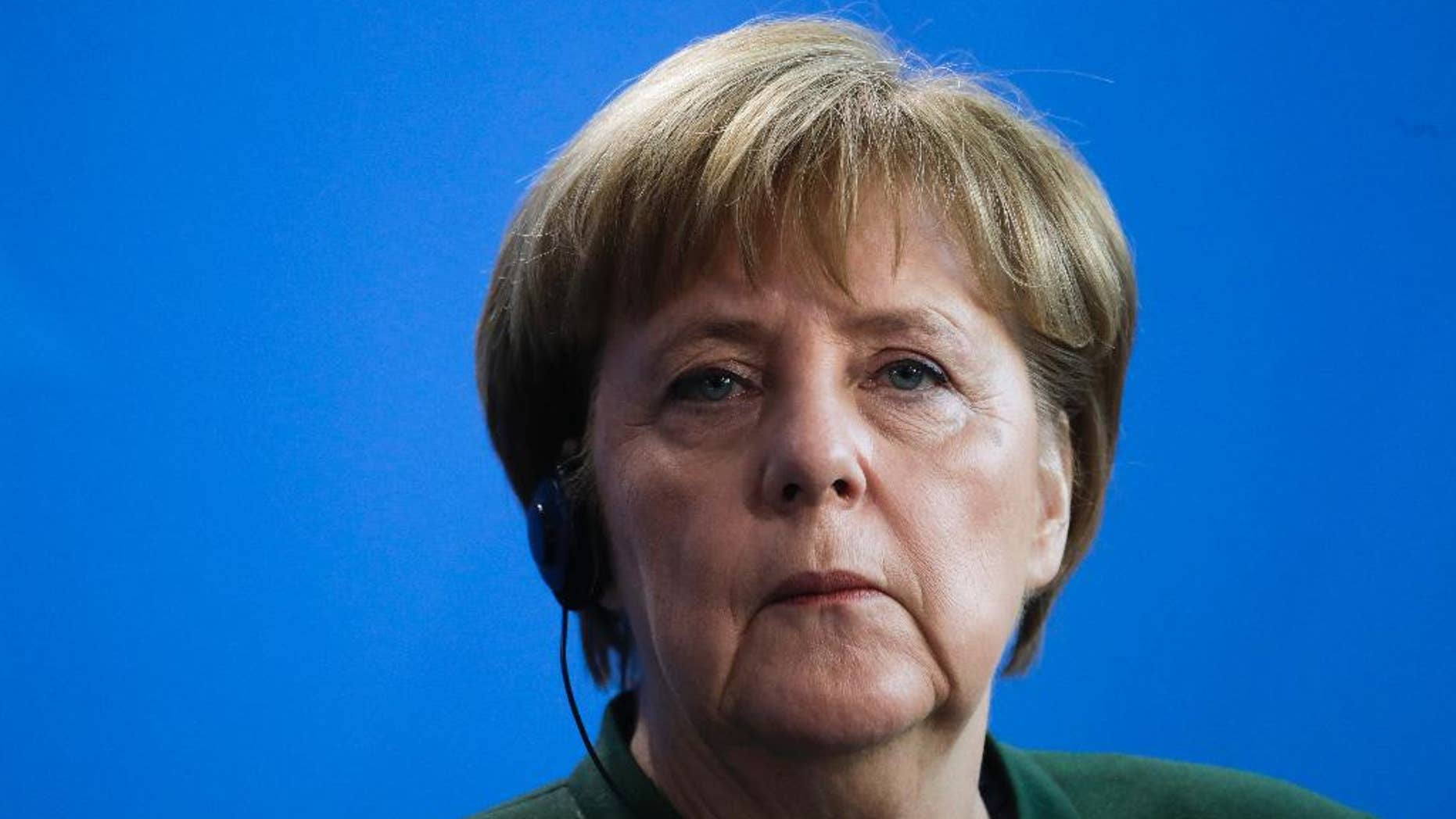 FILE - In this Feb. 14, 2017 file photo German Chancellor Angela Merkel is pictured at a news conference at the chancellery in Berlin. German Chancellor Angela Merkel will visit Egypt and Tunisia this week on Thursday March 2, 2017 and Friday with migration at the top of her agenda as she meets her counterparts in the North African nations. (AP Photo/Markus Schreiber,file)