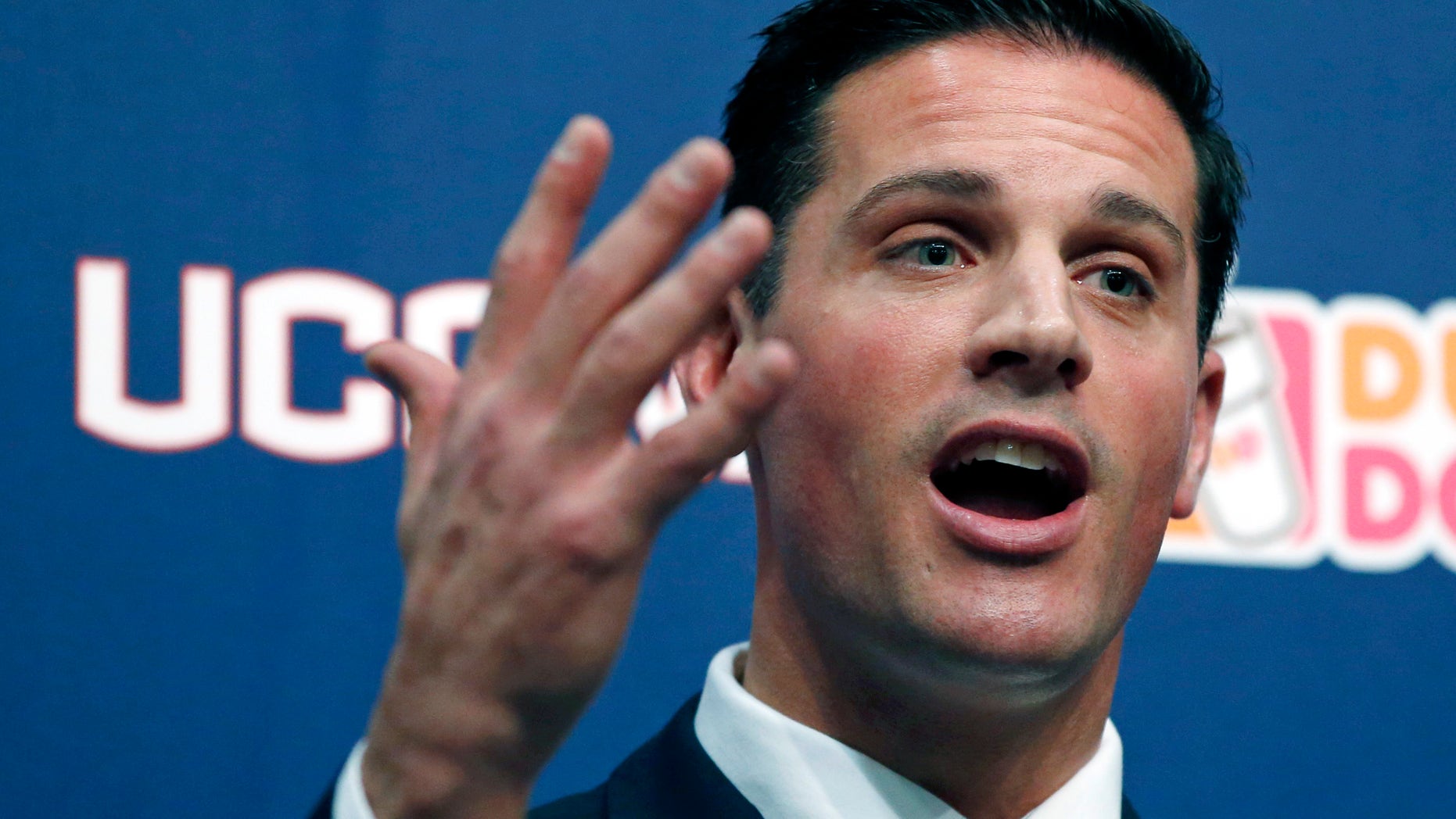 In this Dec. 12, 2013 file photo, Bob Diaco, former Notre Dame defensive coordinator, speaks after being introduced as Connecticut's new head football coach on campus in Storrs, Conn. Diaco acknowledges he’s detail oriented. Two months into the job, there have been some changes at UConn’s Shenkman football training center, all ordered by Diaco, who spent some time with a pad and pen diagramming every room in the building. UConn’s spring practice begins on March 10. (AP Photo/Elise Amendola, File)