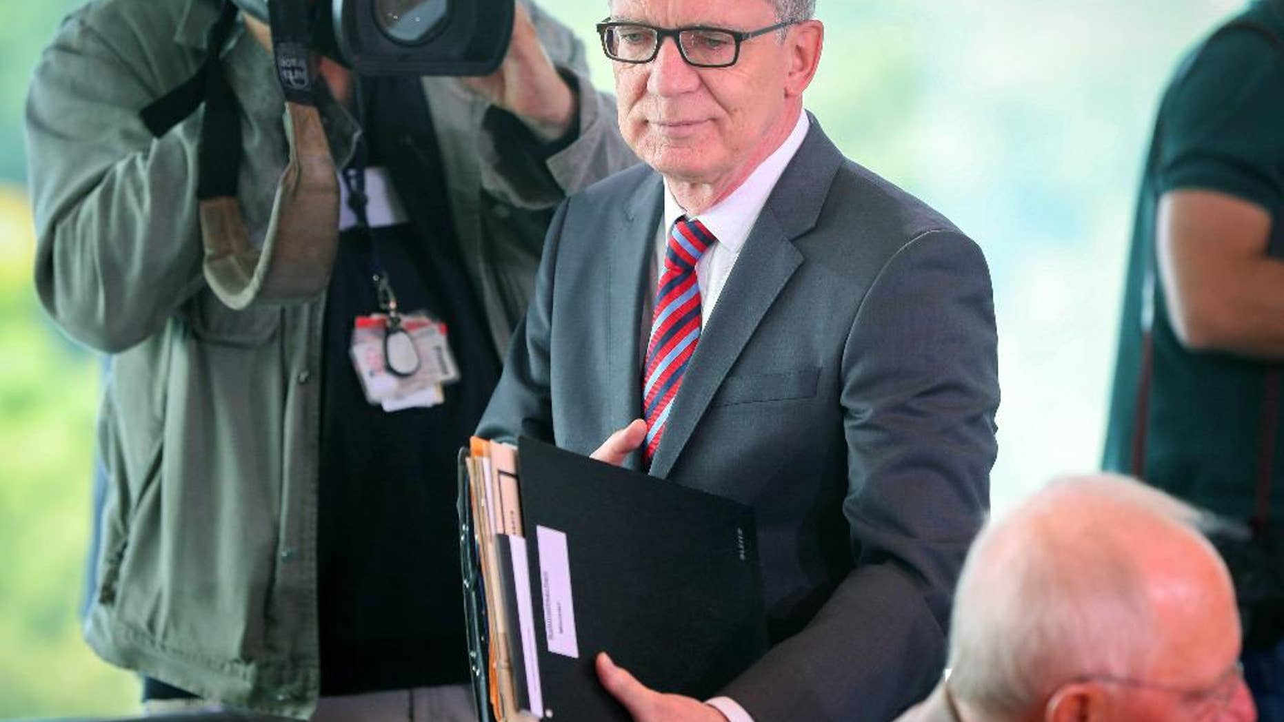 Aug. 17, 2016: German Interior Minister Thomas de Maiziere arrives for a cabinet meeting at the chancellery in Berlin.