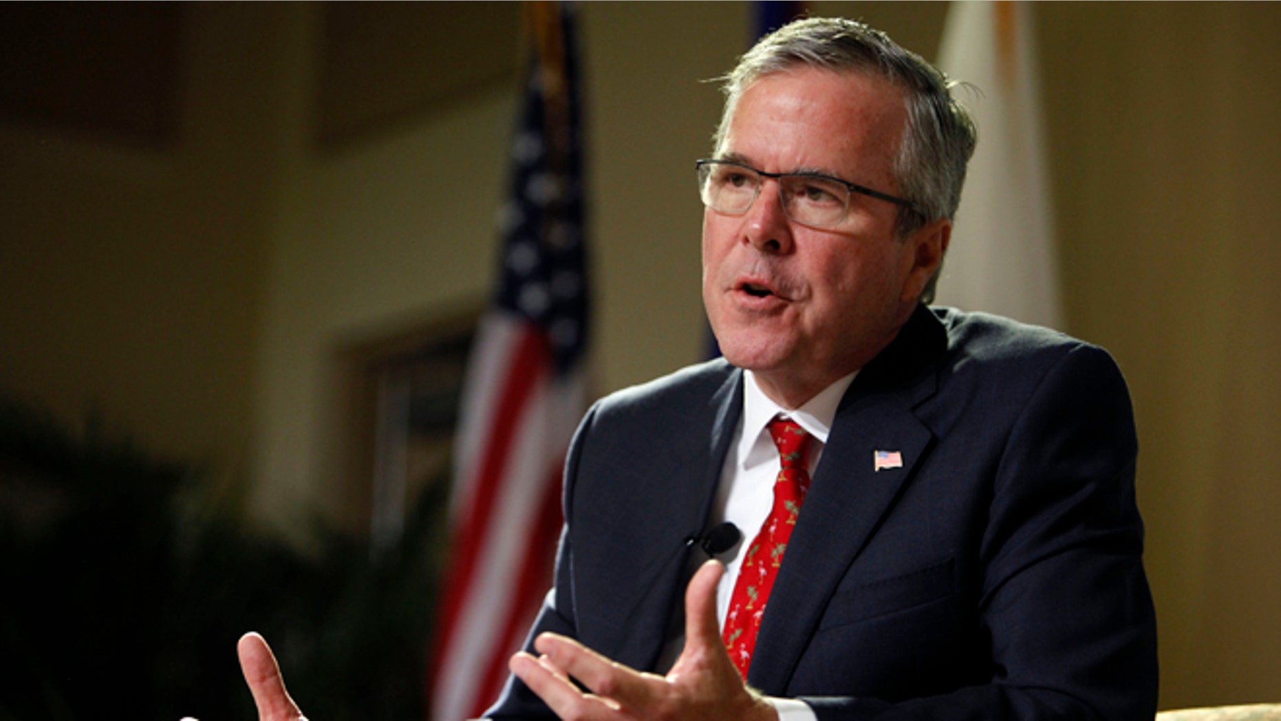 Former Florida Gov. Jeb Bush speaks during an event at the Metropolitan University in San Juan, Puerto Rico, Tuesday, April 28, 2015. The former Florida governor delivered a speech on economic opportunities partly in Spanish on Tuesday, and his audience responded with hearty applause. Bush is fluent in the language, and often uses it in Florida, but it's rarely heard in Republican presidential campaign politics. (AP Photo/Ricardo Arduengo)