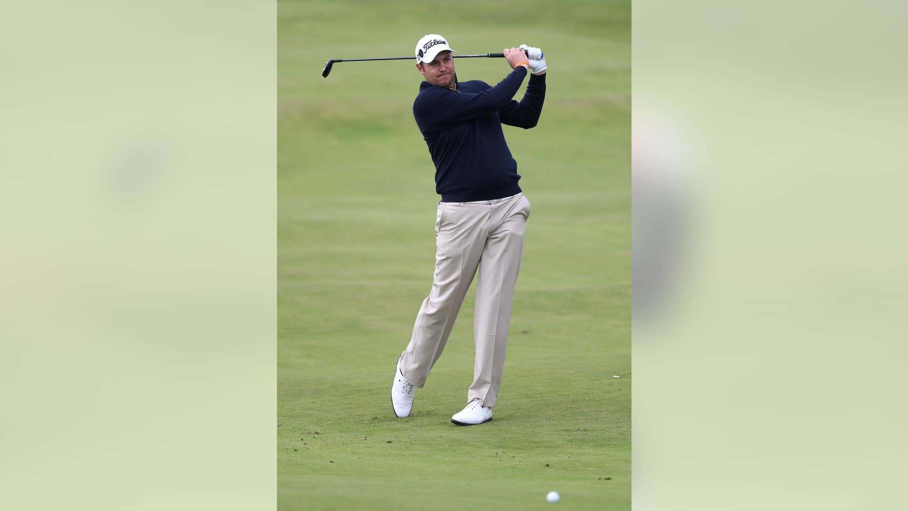 Matthew Southgate of England plays his shot on the 6th fairway during a practice round for the British Open Golf Championships at the Royal Troon Golf Club in Troon, Scotland, Tuesday, July 12, 2016. (AP Photo/Peter Morrison)