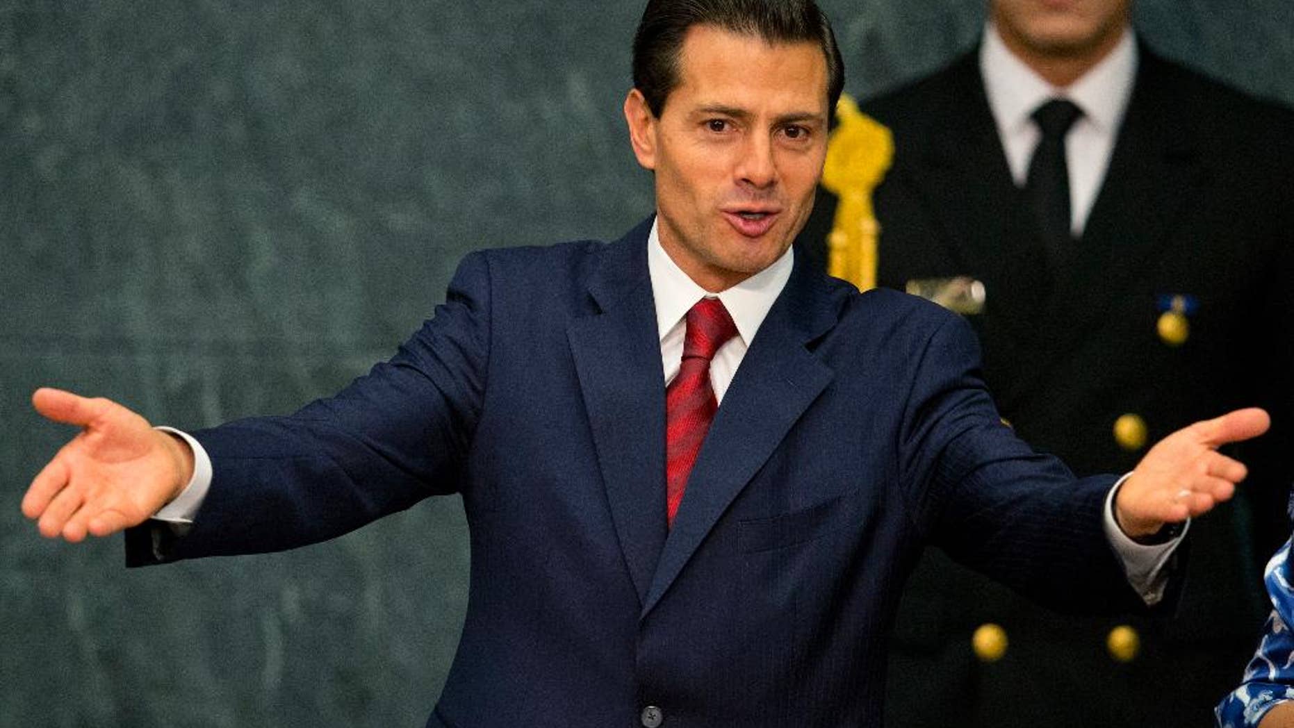 FILE - In this May 24, 2016 file photo, Mexican President Enrique Pena Nieto opens the 36th session of the Economic Commission for Latin America and the Caribbean, at Los Pinos presidential residence in Mexico City. A Mexican news outlet published Sunday, Aug. 21, 2016, a report alleging that Pena Nieto’s thesis for his law degree was heavily plagiarized. Aristegui Noticias says 29 percent of the thesis was material lifted from other works. (AP Photo/Rebecca Blackwell, File)