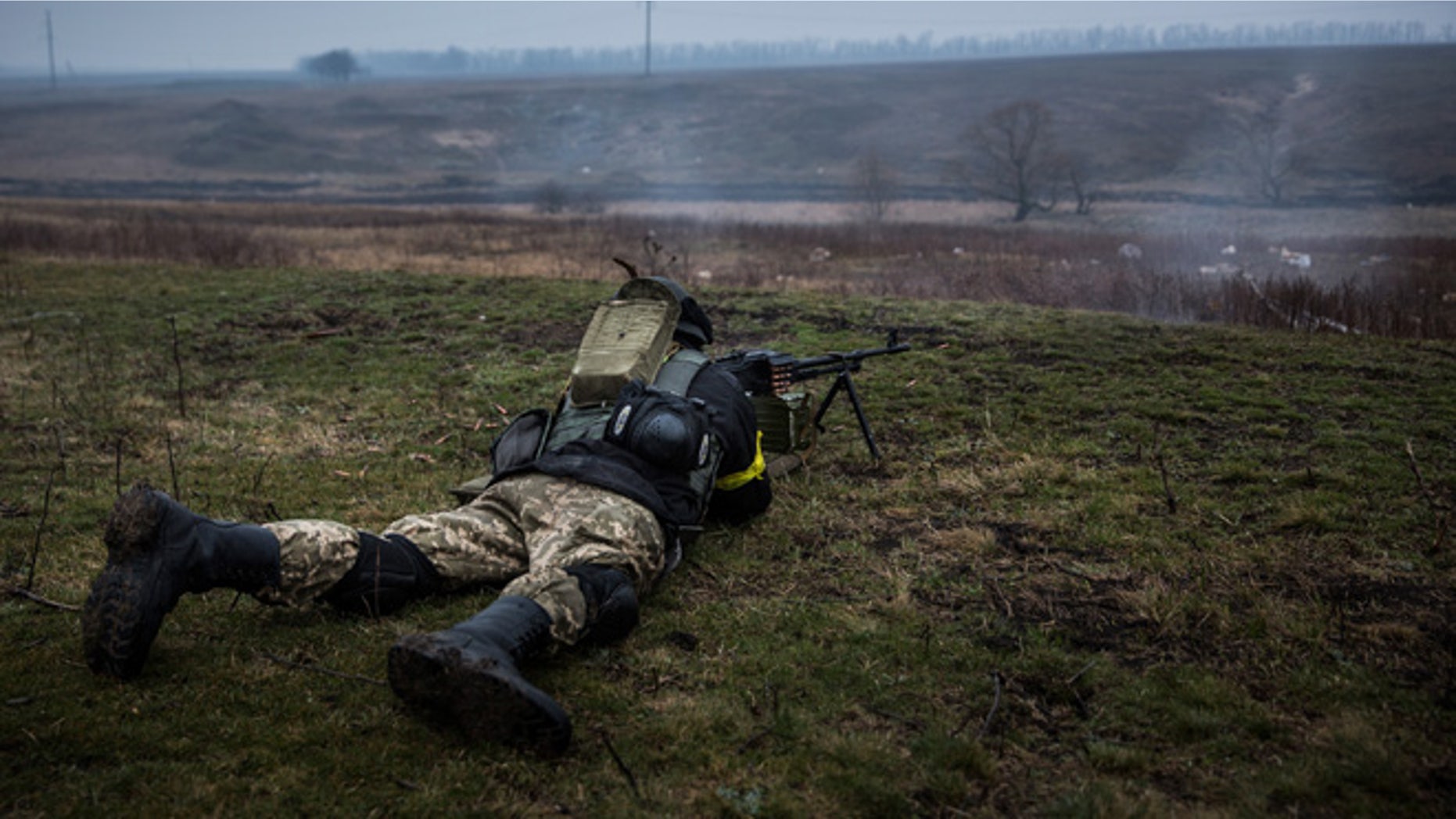 Ukrainian troops from Donbass battalion train with small arms on March 13, 2015 outside Mariupol, Ukraine.