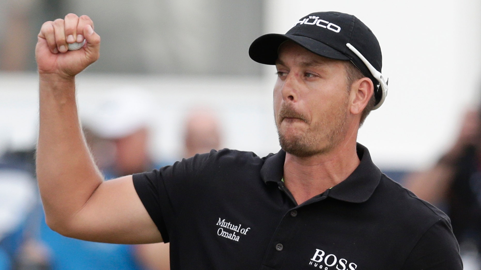 FILE - In this Nov. 17, 2013, file photo, Henrik Stenson from Sweden celebrates after winning the DP World Golf Championship, in Dubai, United Arab Emirates. Stenson is now in South Africa to play in the Nedbank Golf Challenge starting Thursday, Dec. 5, 2013. (AP Photo/Hassan Ammar, File)
