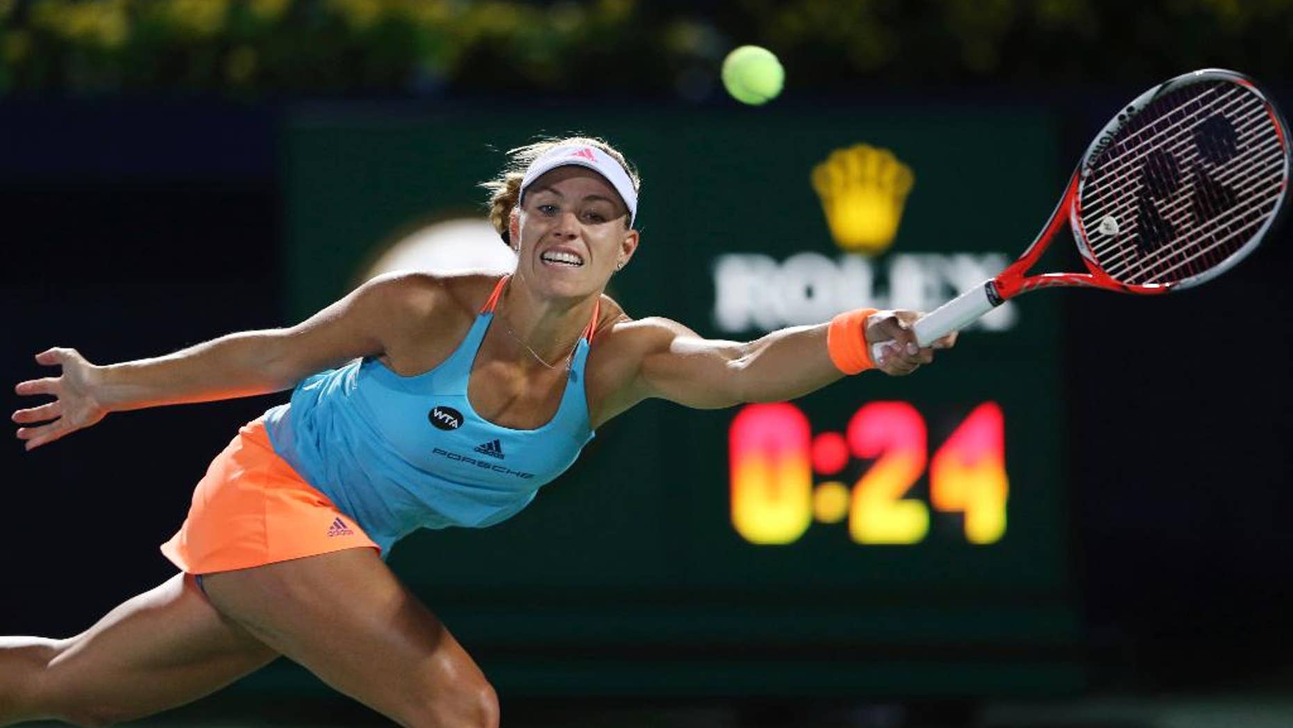 FILE - In this Feb. 21, 2017, file photo, Angelique Kerber, of Germany, returns the ball to fellow German Mona Barthel during the Dubai Tennis Championships, in Dubai, United Arab Emirates. Kerber is back at No. 1 in the WTA rankings, reclaiming that spot from Serena Williams. Kerber moved atop the rankings Monday, March 20. That's about six months after she originally ascended to No. 1 for the first time, overtaking Williams by winning the U.S. Open. (AP Photo/Kamran Jebreili, File)