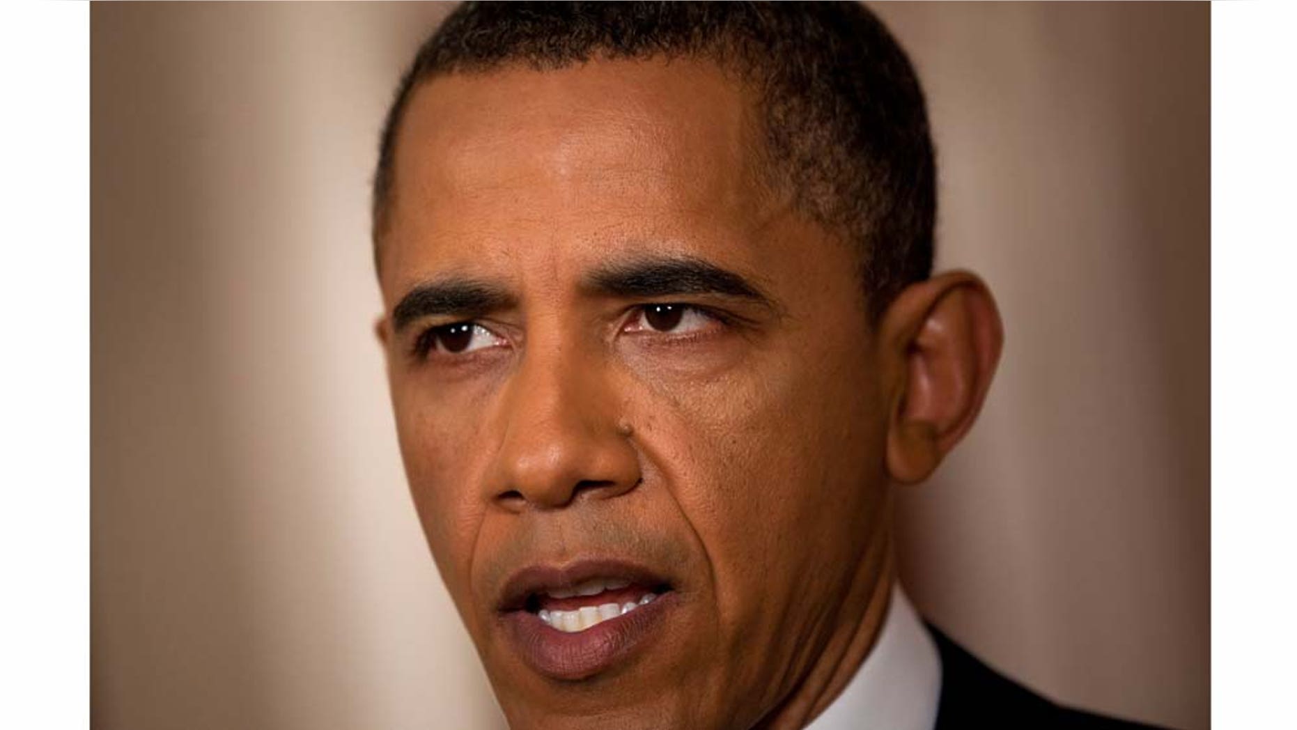 WASHINGTON, DC - MAY 1: (AFP OUT) U.S. President Barack Obama speaks after addressing the nation on TV from the East Room of the White House to make a televised statement May 1, 2011 in Washington, DC. Bin Laden has been killed near Islamabad, Pakistan almost a decade after the terrorist attacks of Sept. 11, 2001 and his body is in possession of the United States. (Photo by Brendan Smialowski-Pool/Getty Images)